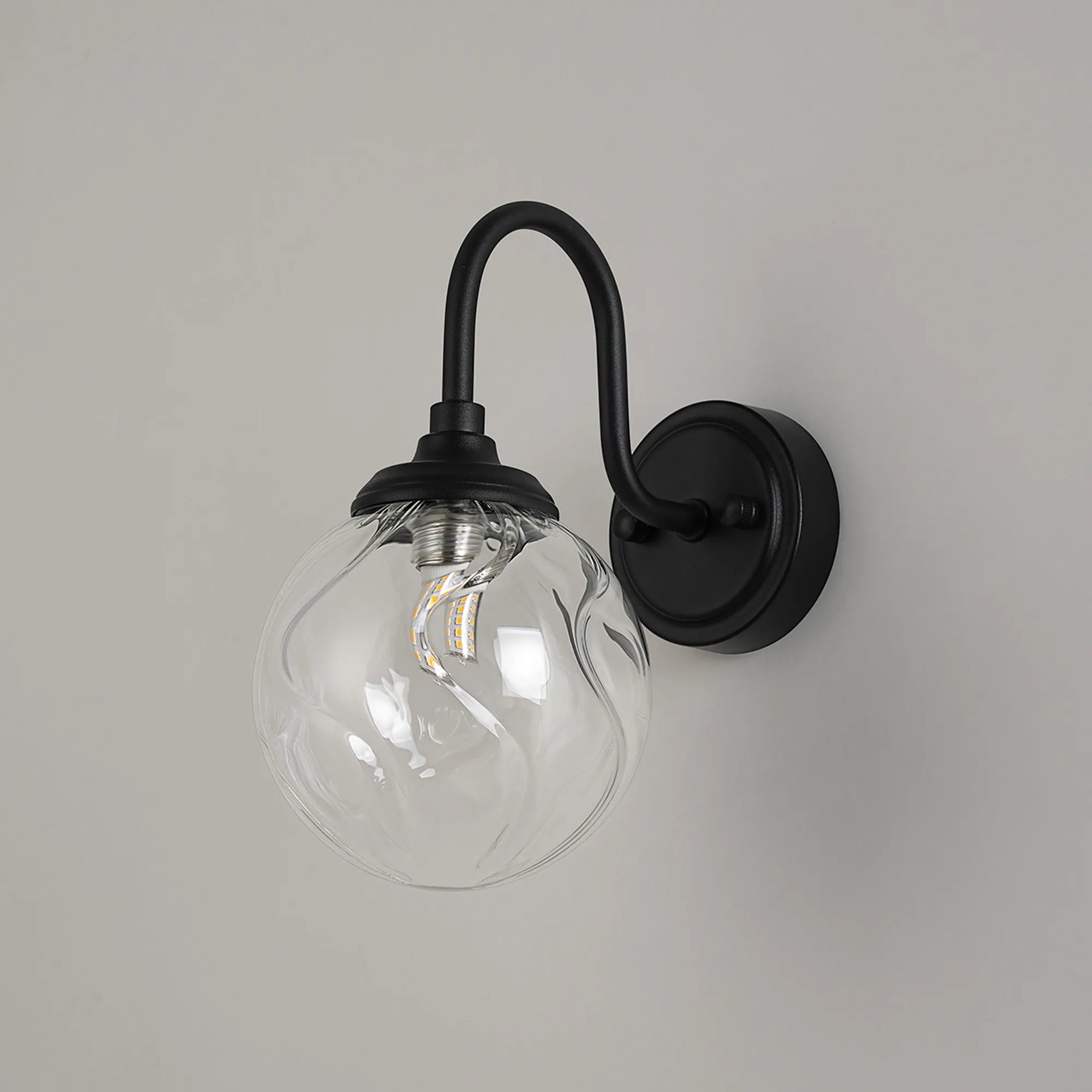 Dene Curved Arm Wall Light - 1 Light - IP44 Satin Black & Clear Waved Round Glass