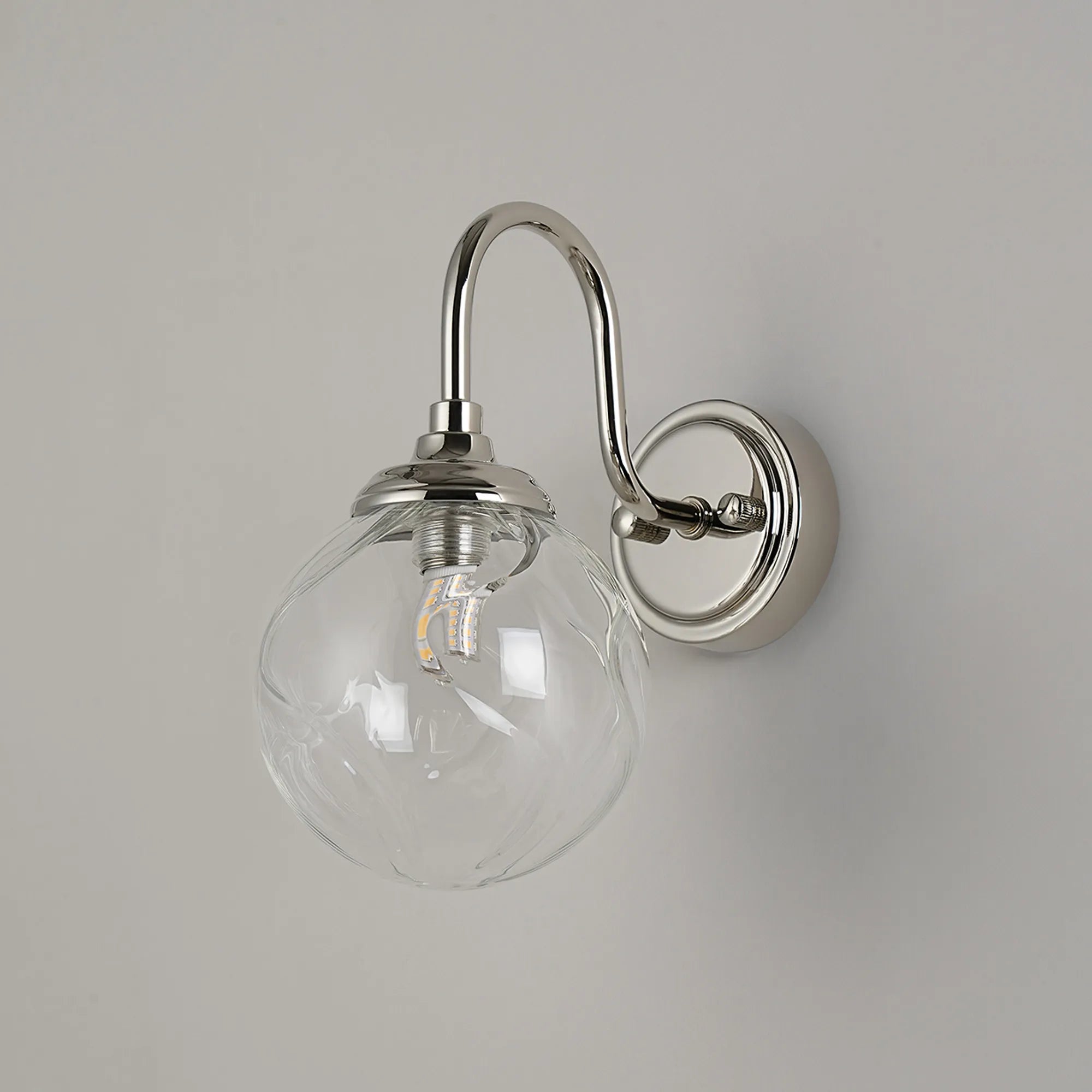 Dene Curved Arm Wall Light - 1 Light - IP44 Polished Nickel & Clear Waved Round Glass