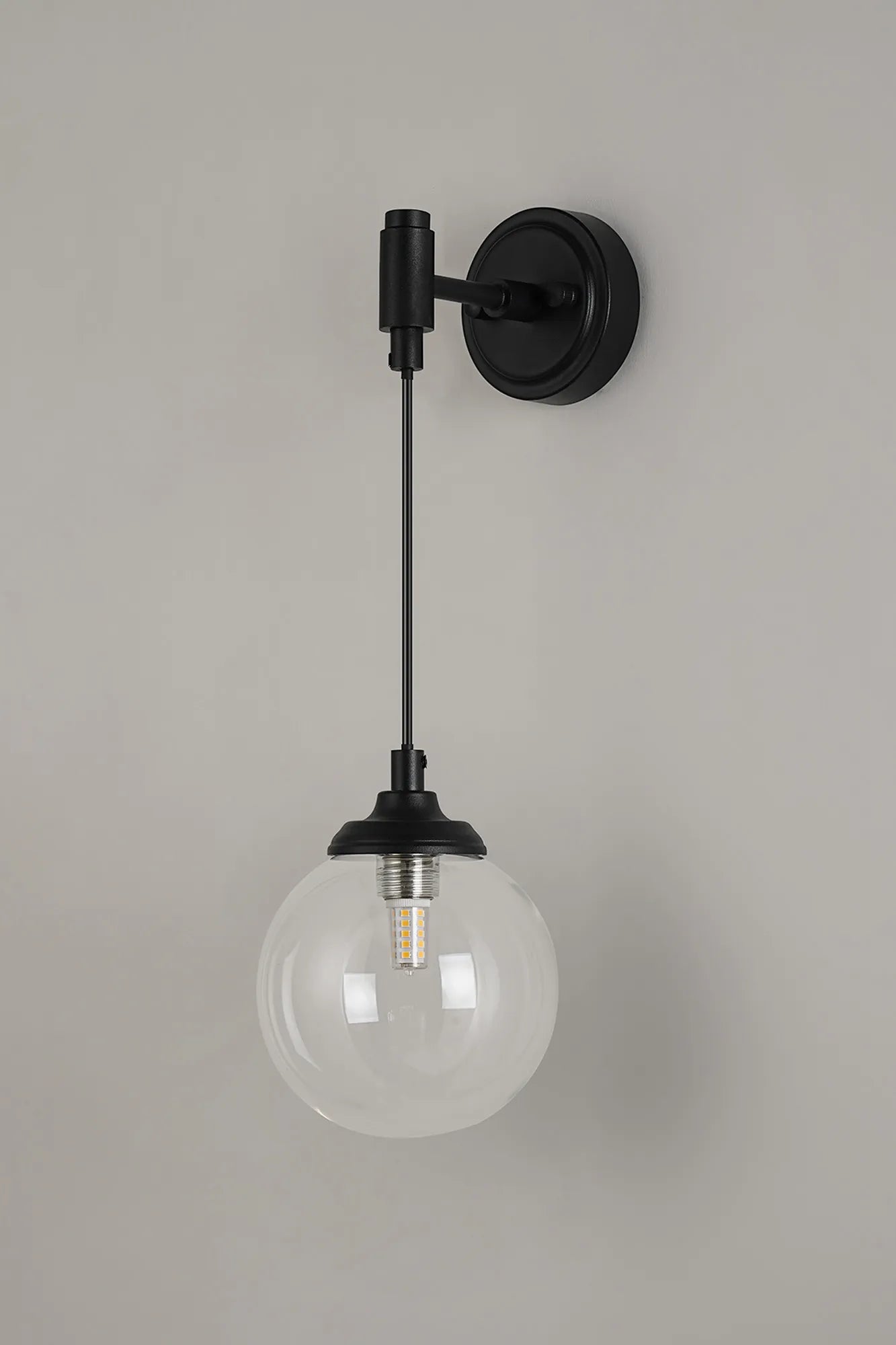 Dene Adjustable Single Wall Light IP44 - Satin Black & Clear Smooth Round Glass