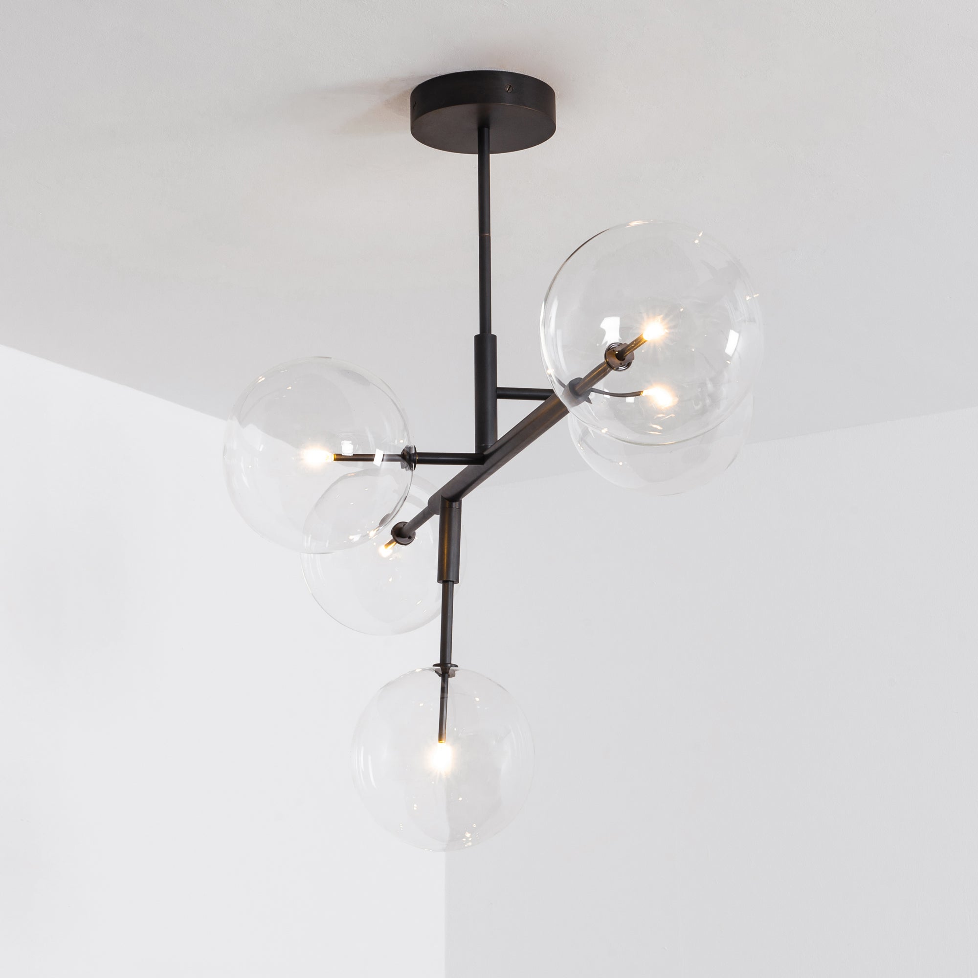 Schwung Axis 5 Light Chandelier - Transparent Glass