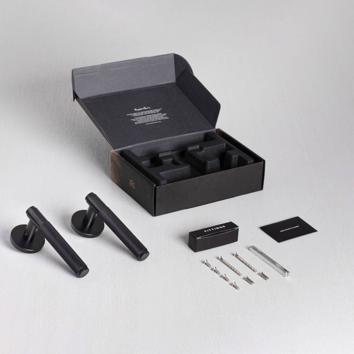 Buster + Punch Door Handle Set - Cross Knurl