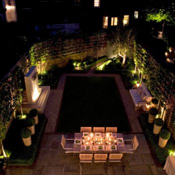 What is low-voltage lighting, and what are its advantages for garden lighting?