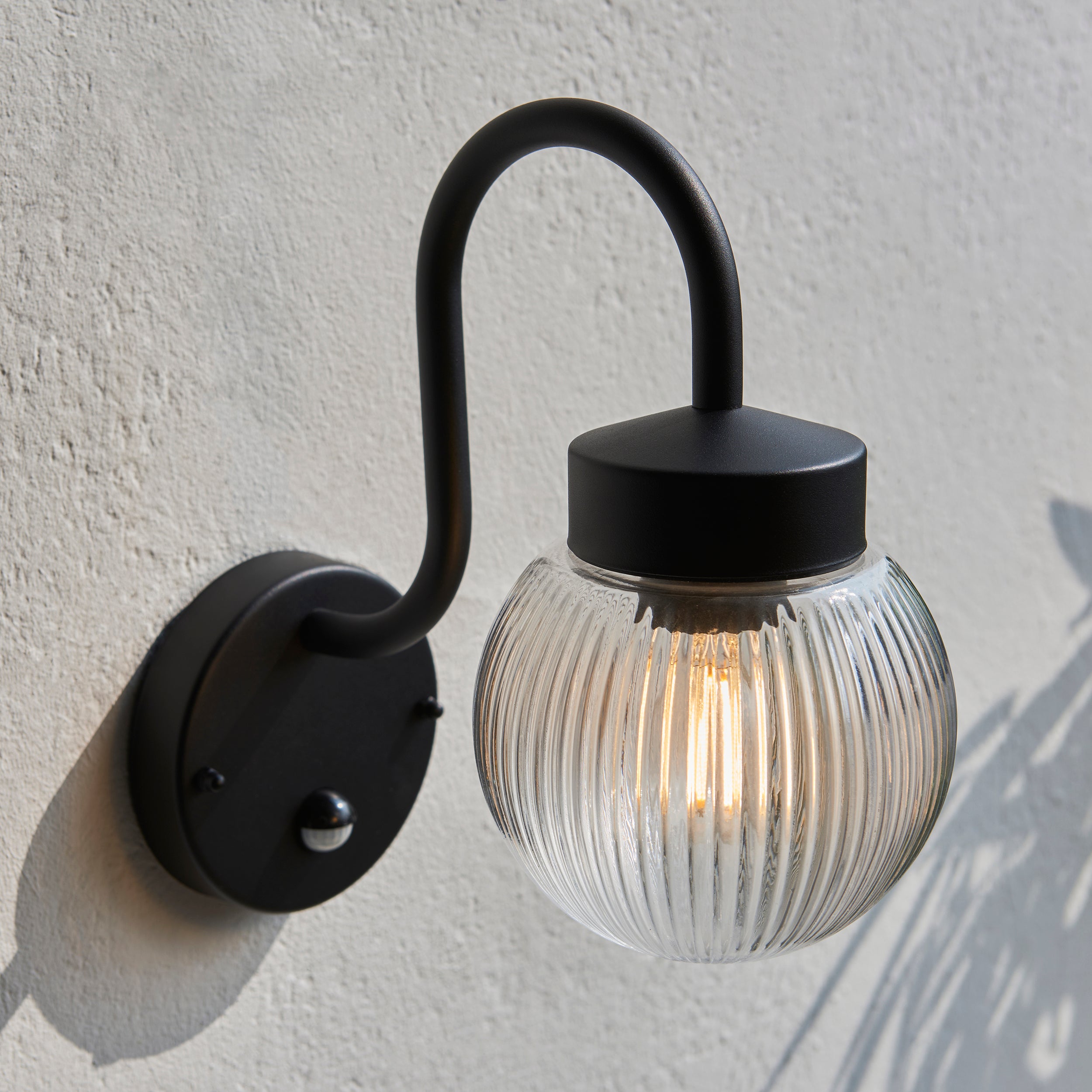 Endon Eldon Single Wall Light with PIR - Textured Black & Clear Ribbed Glass