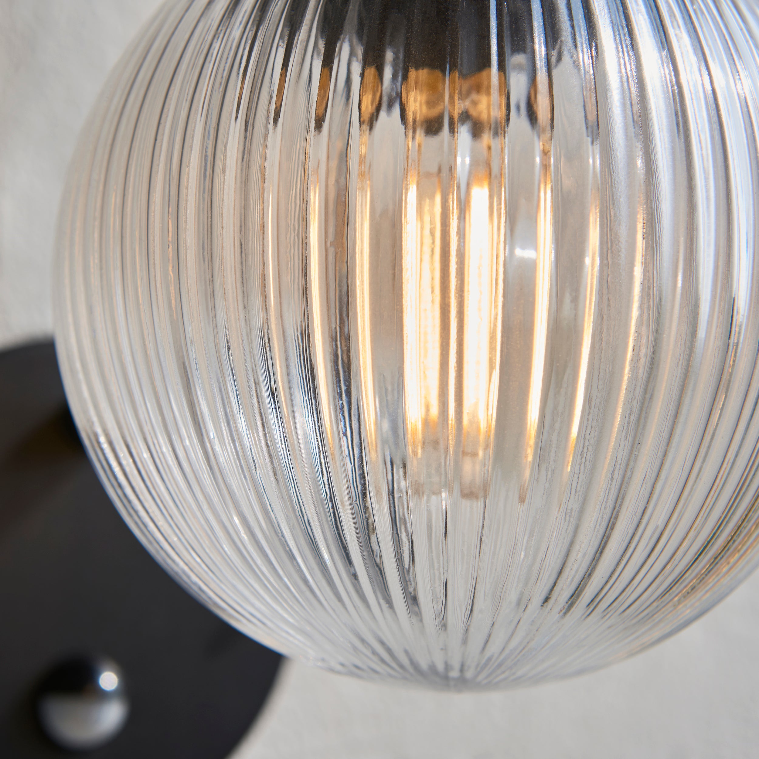 Endon Eldon Single Wall Light with PIR - Textured Black & Clear Ribbed Glass