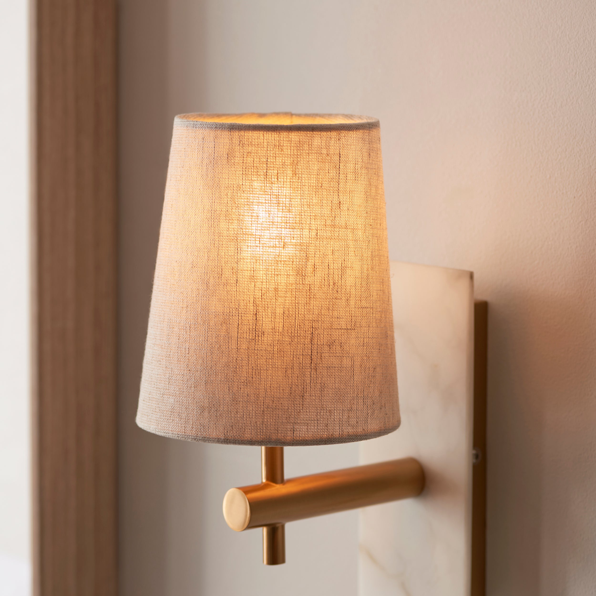 Utopia Spire Single White Marble Wall Light - Vintage Brass & Natural Tapered Shade