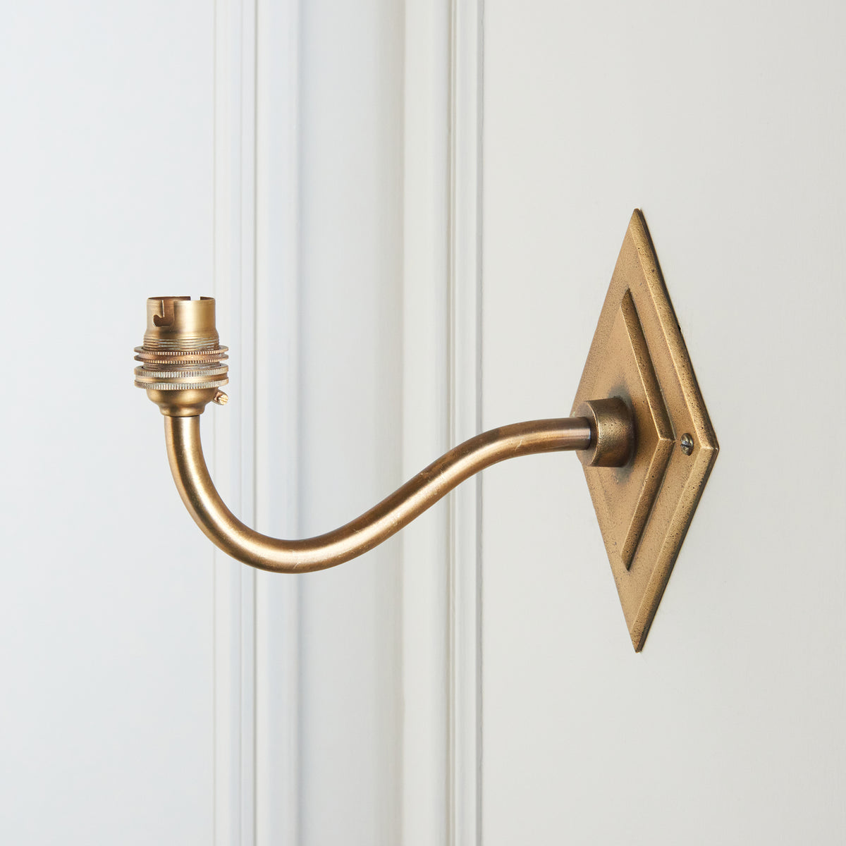 Endon Diamond Curve Wall Fitting - Antique Brass Plate