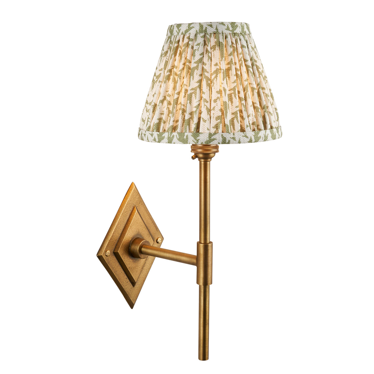 Endon Diamond Tall wall light in antique brass with herb garden green leaf print pleated shade, lit, cut out on white