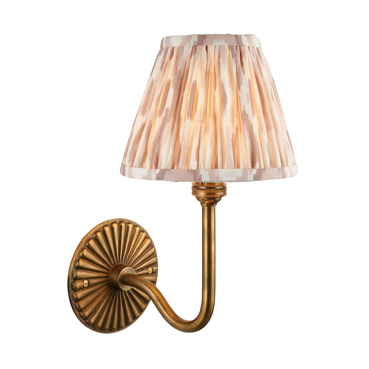 Endon Dahlia Swan wall light unlit on white, antique brass ribbed backplate and swan neck arm with pleated pink and cream ikat shade