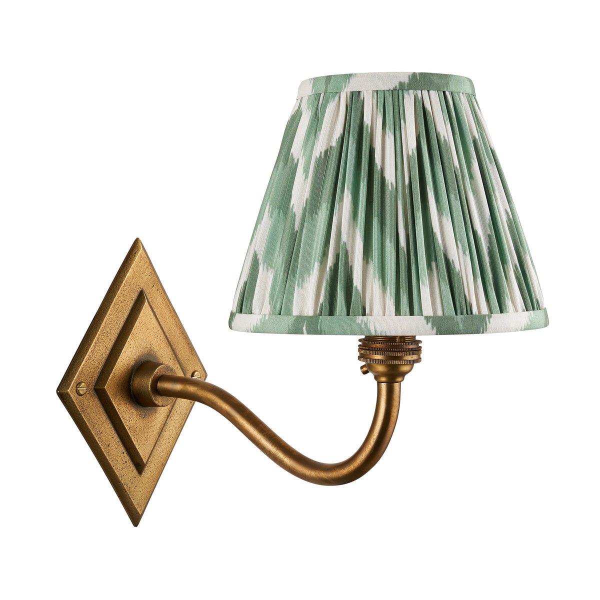 Endon Diamond Curve wall light in antique brass with a Cotswold green zigzag shade, switched off, cut out on a white background