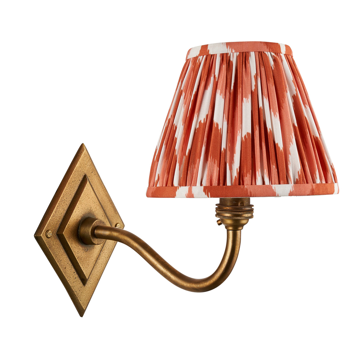 Endon Diamond Curve antique brass wall light with apricot orange zigzag shade, product shot on white showing the curved arm and diamond backplate