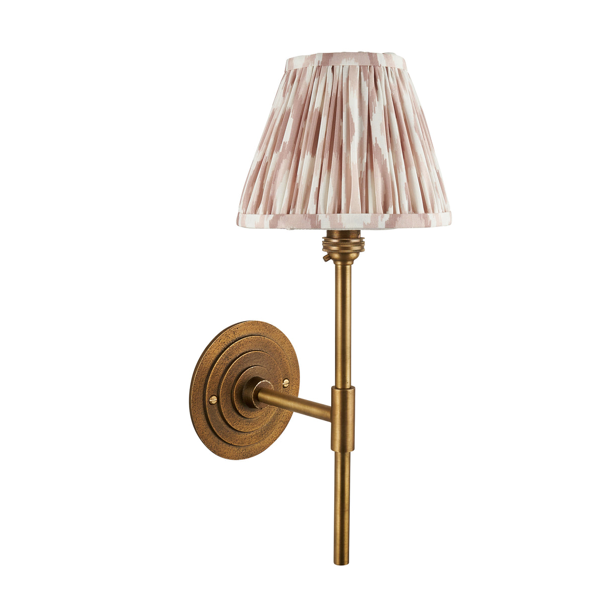 Endon Halo Tall wall light unlit, cut out on white, antique brass ringed backplate and stem with a pink and cream Ikat pleated shade