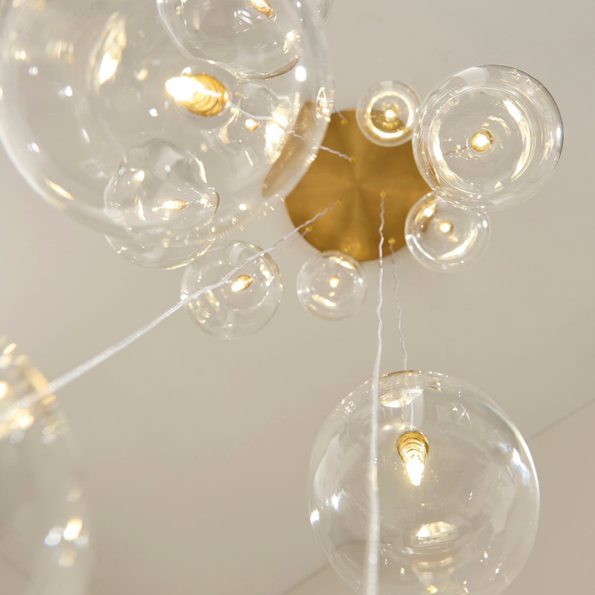Endon Oslo 12 Light Cascade Pendant - Brushed Aged Brass Plate & Clear Glass