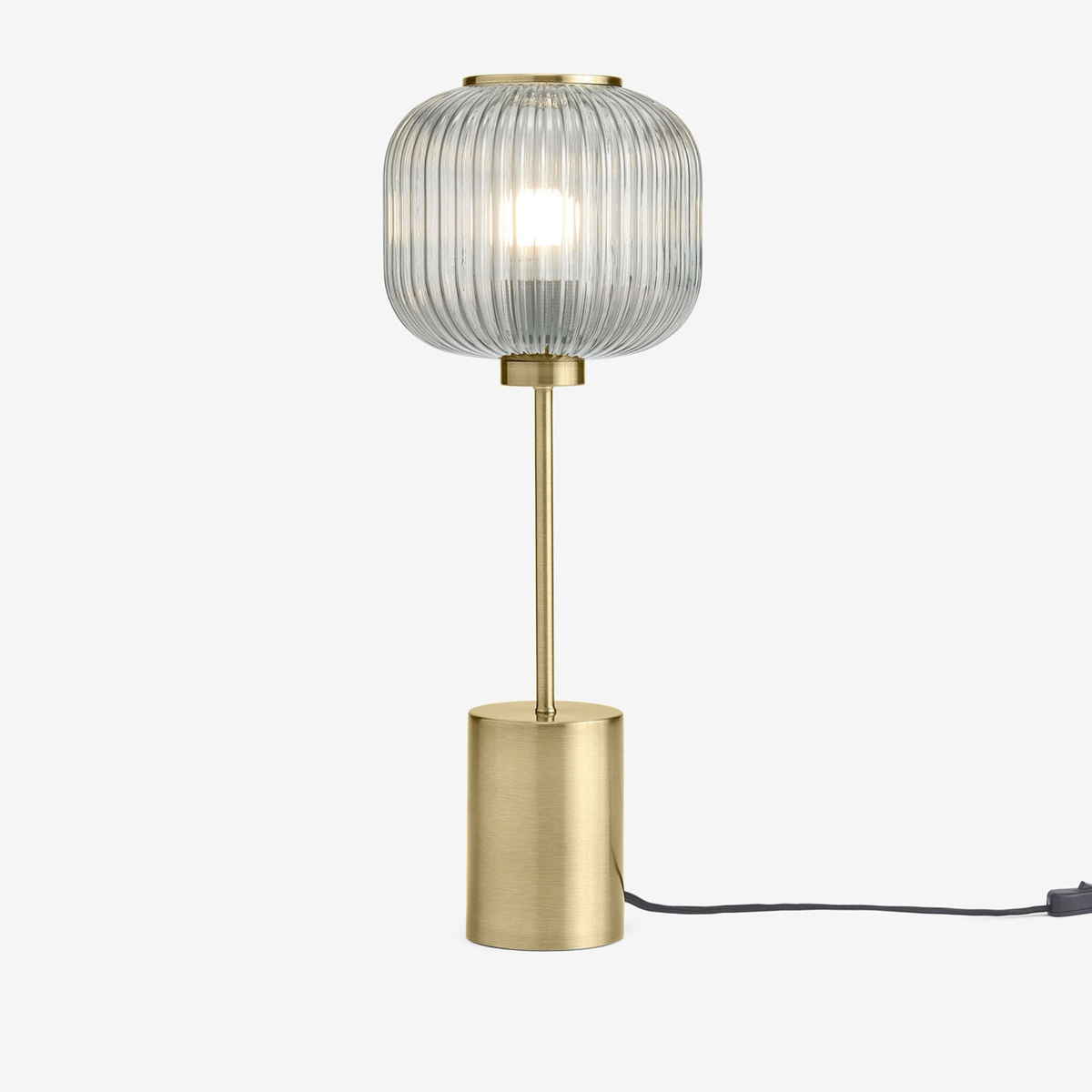 MADE.COM Briz large table lamp in brushed brass with ribbed grey glass shade, studio shot with cable