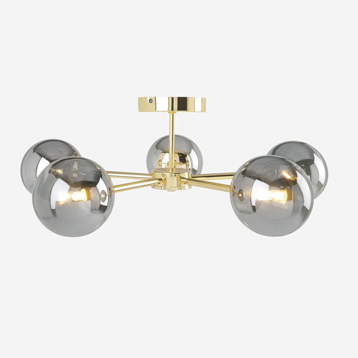 MADE Globe 5 light flush ceiling light in brass with smoked glass globes, studio side view