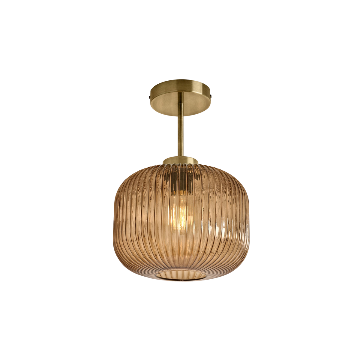 MADE.COM Briz flush ceiling light in antique brass with ribbed amber glass shade, white studio shot