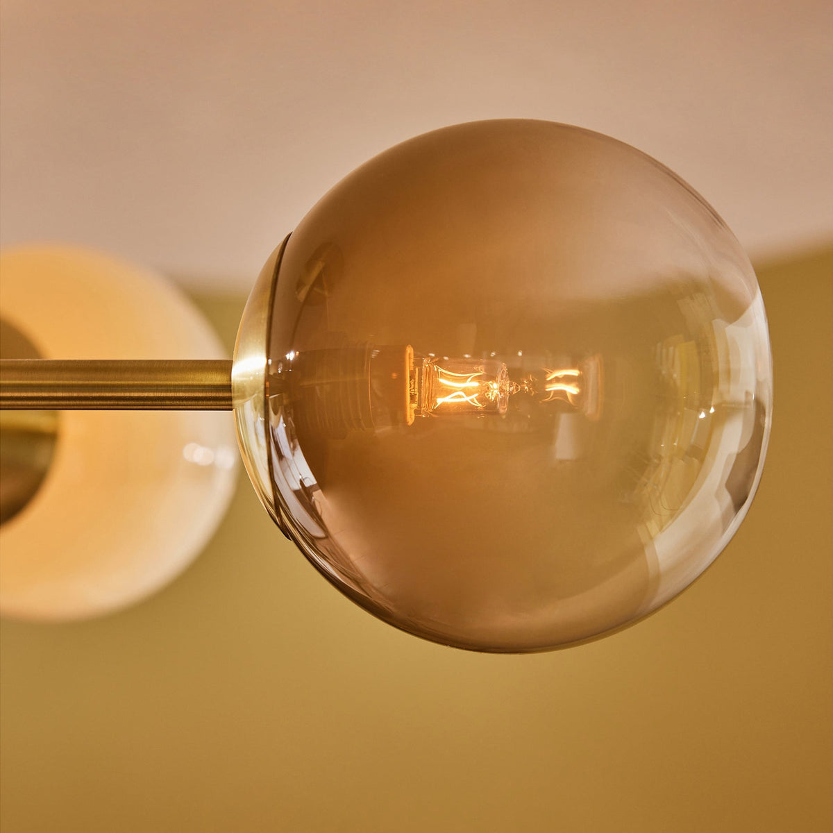 MADE.COM Globe 5 Light Flush Ceiling Light in Brushed Brass with Green Ombre Glass Globes