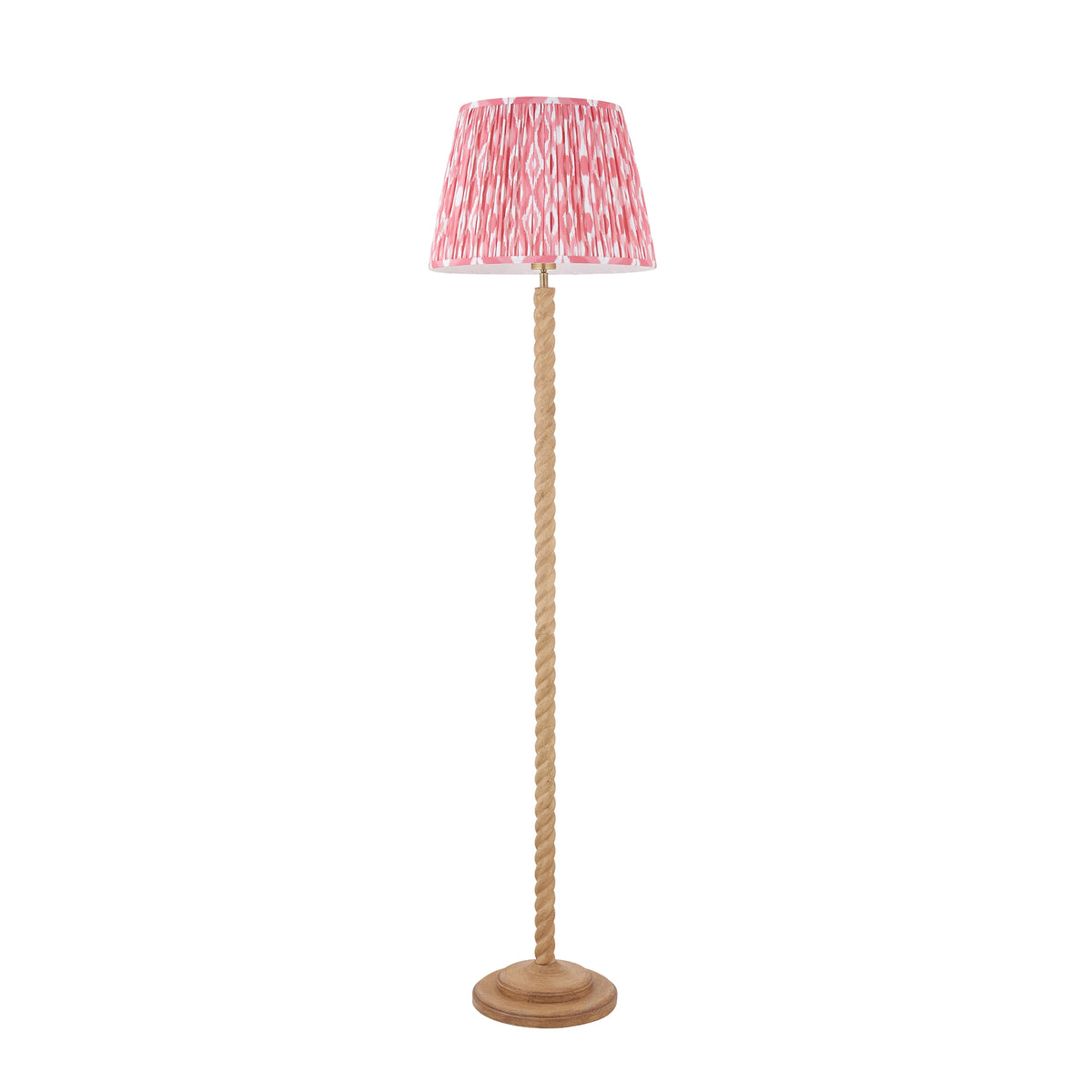Second cut out of the Endon Twist floor lamp, oak effect twisted stem with coral pink ikat shade, unlit on white