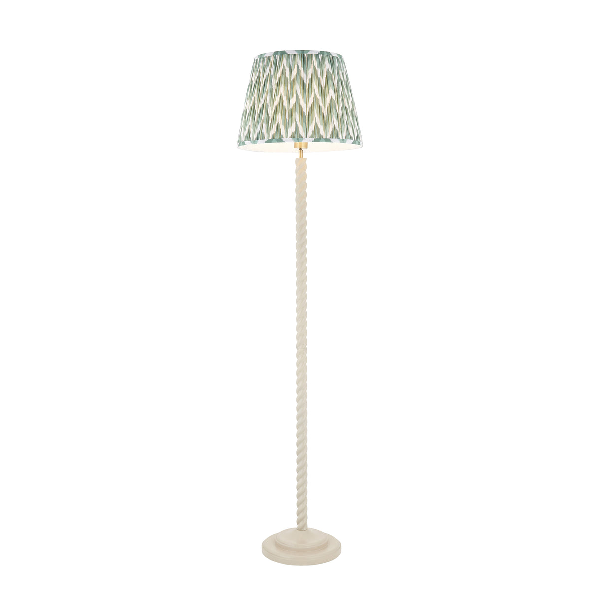Endon Twist floor lamp in satin almond white with a 40cm Cotswold green zigzag pleated shade, lit, cut out on a white background