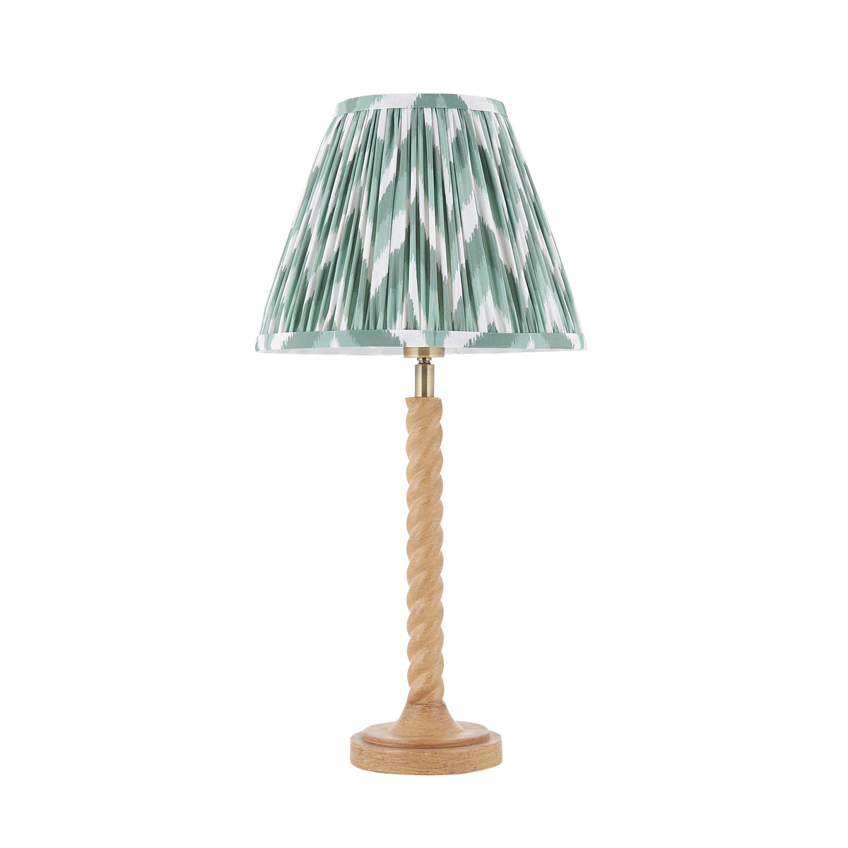 Endon Twist table lamp in oak effect resin with Cotswold green zigzag shade, unlit, cut out on a white background