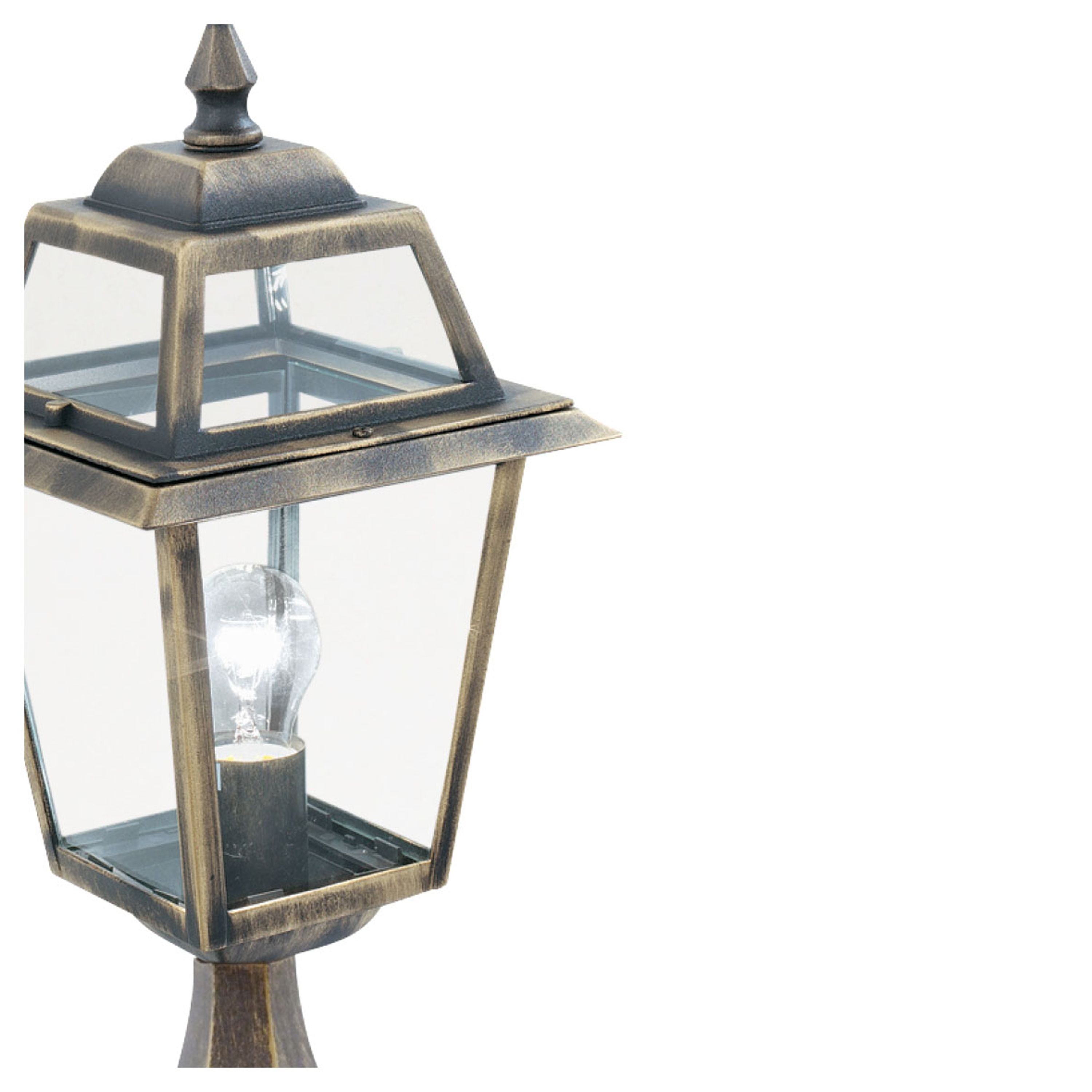 Close up of the New Orleans outdoor post light lantern head and black and gold frame detail