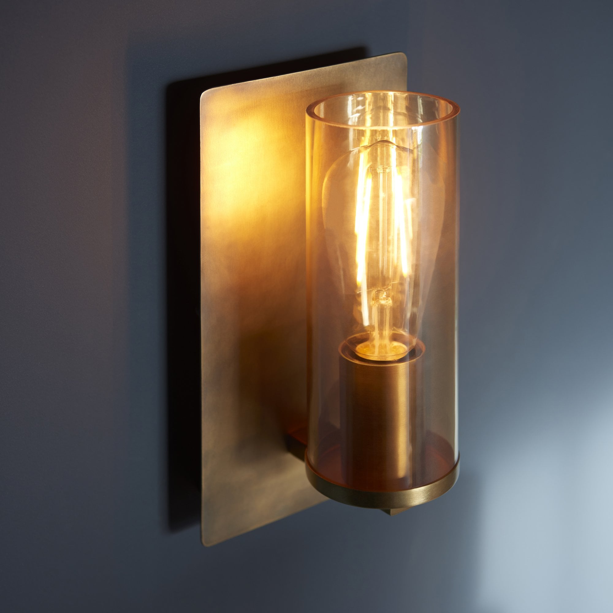 Utopia Swirl Wall Light - Brass Patina With Champagne Tinted Glass