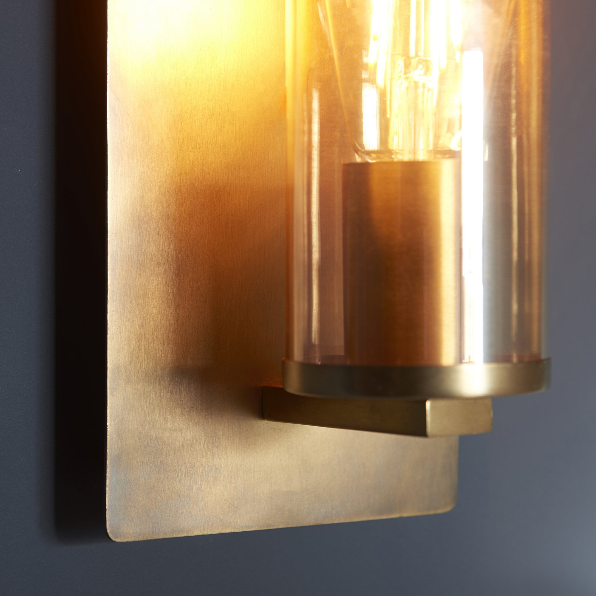 Utopia Swirl Wall Light - Brass Patina With Champagne Tinted Glass