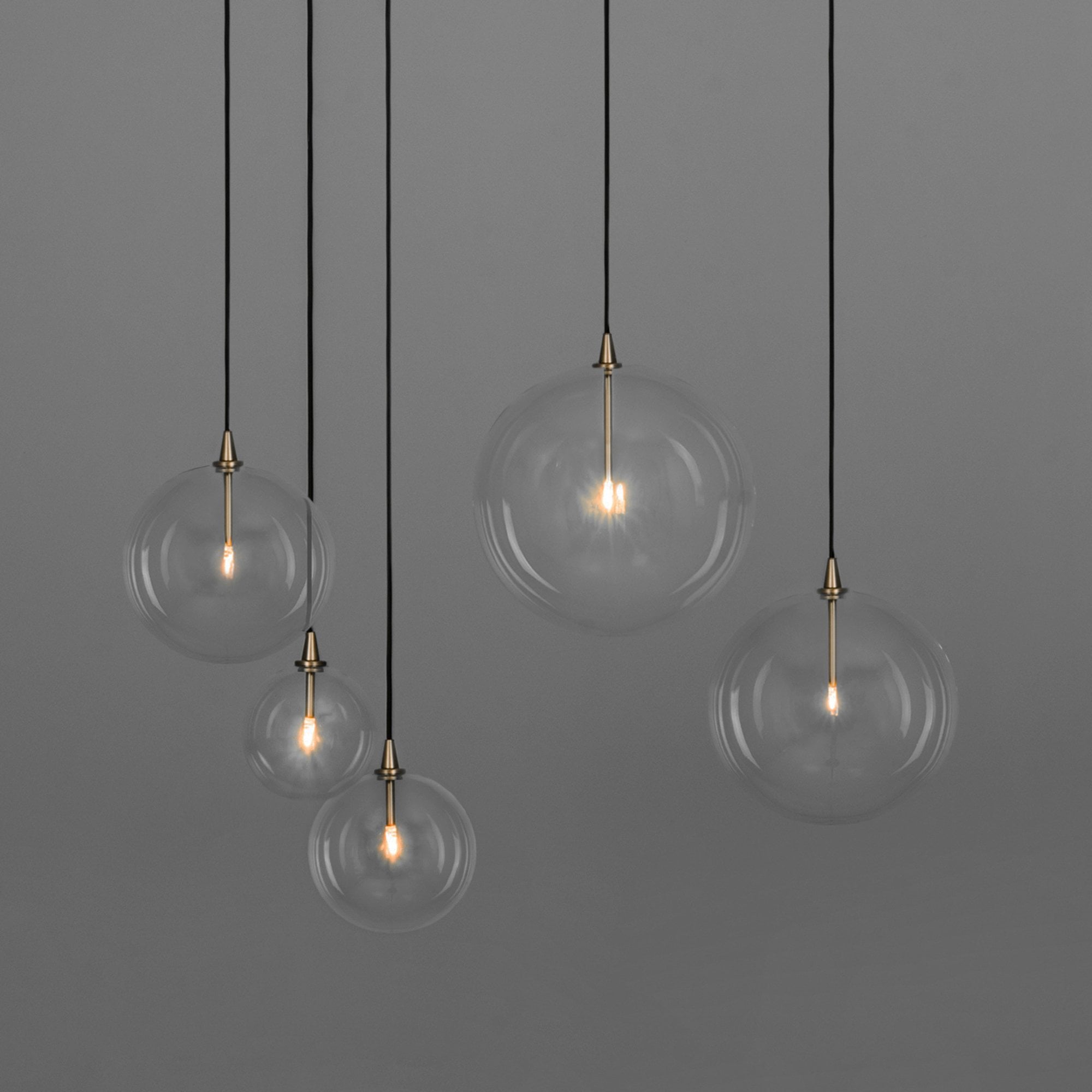 Schwung Glass Globe Single Pendant - Transparent Glass