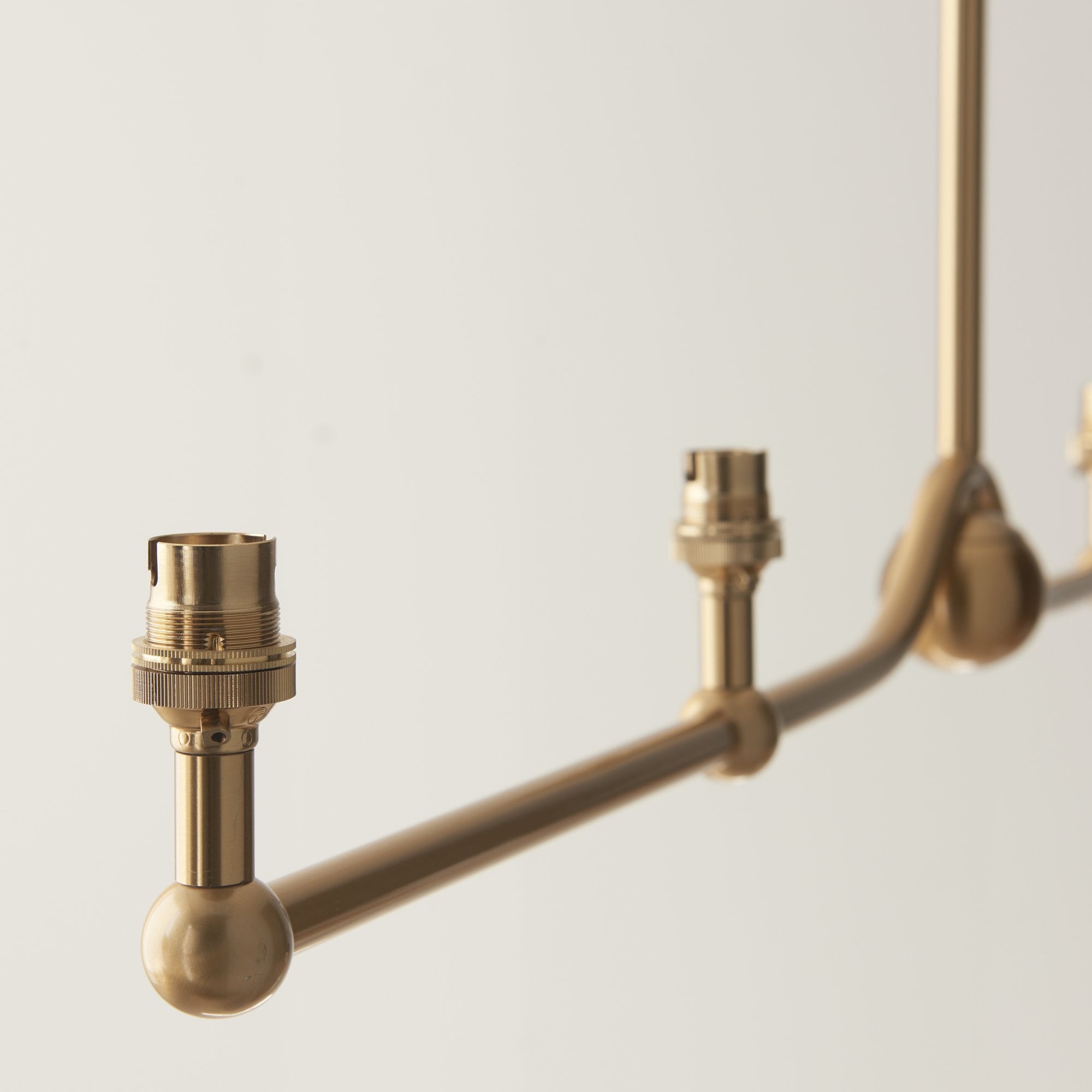 Endon Santiago 4 Light Linear Pendant - Brushed Aged Brass Plate