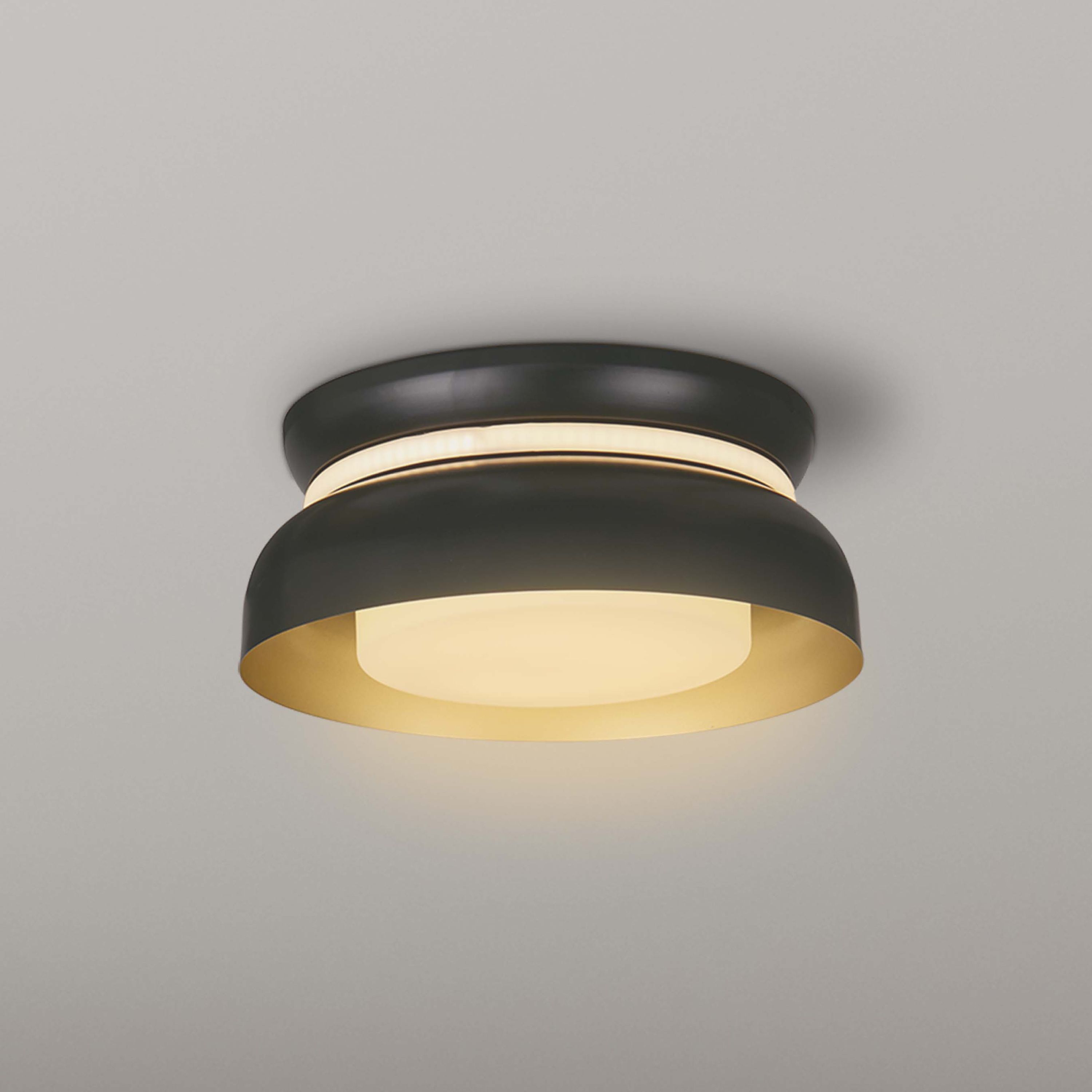 Searchlight Kendal 2 light flush ceiling light in black and gold mounted on a grey ceiling, close angled view
