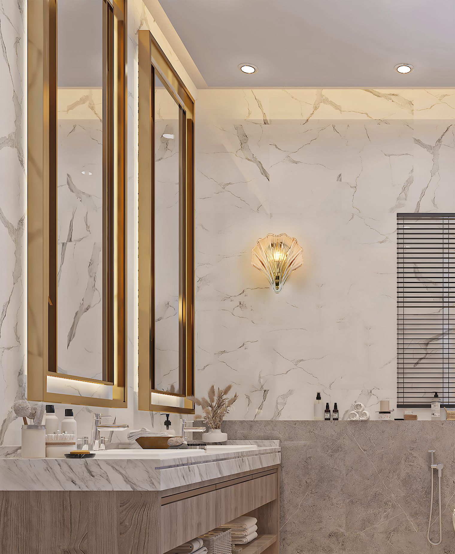 Shell wall light in satin brass with amber glass mounted on a marble bathroom wall beside a vanity mirror