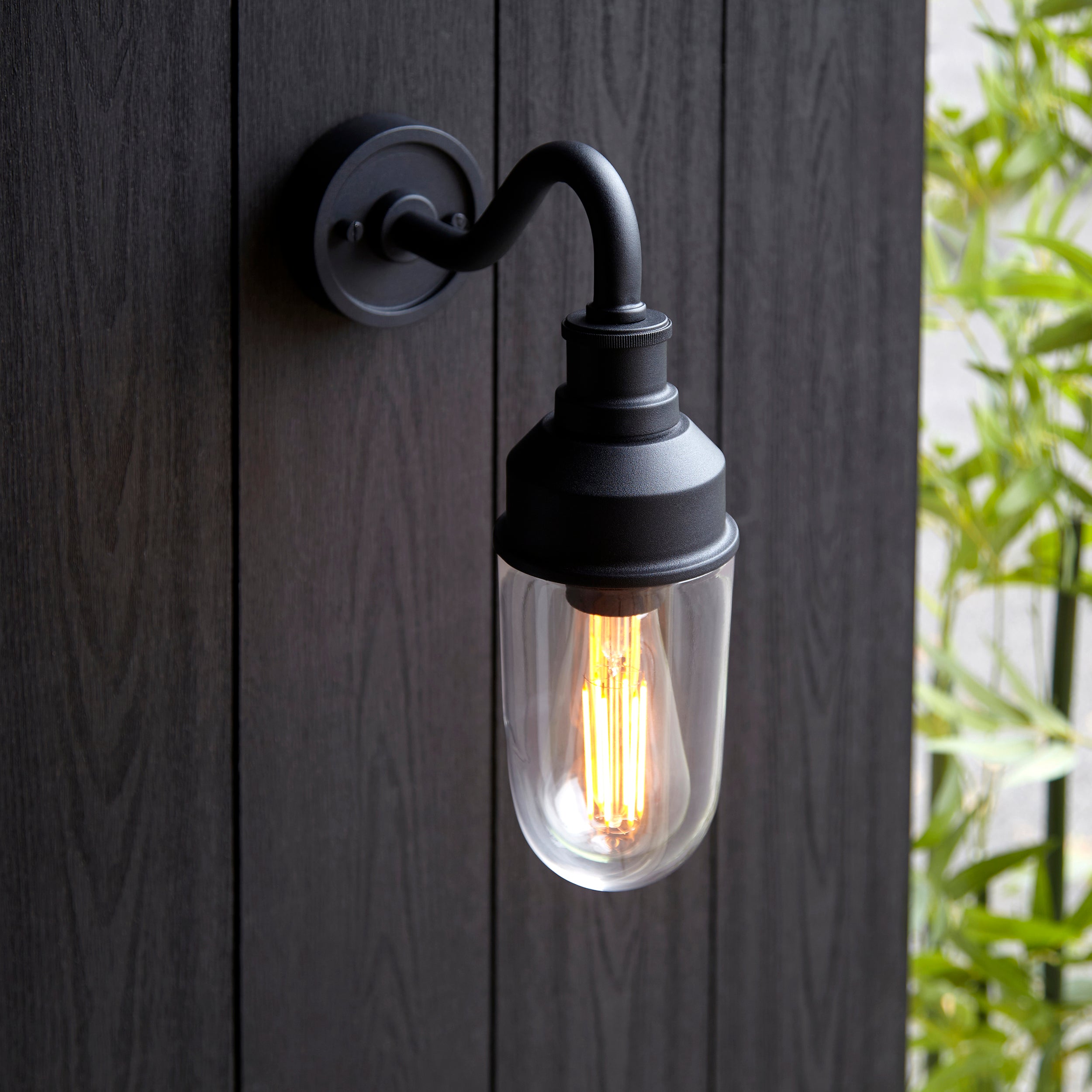 Utopia Frontier Curved Arm Wall Light - Textured Black & Clear Glass