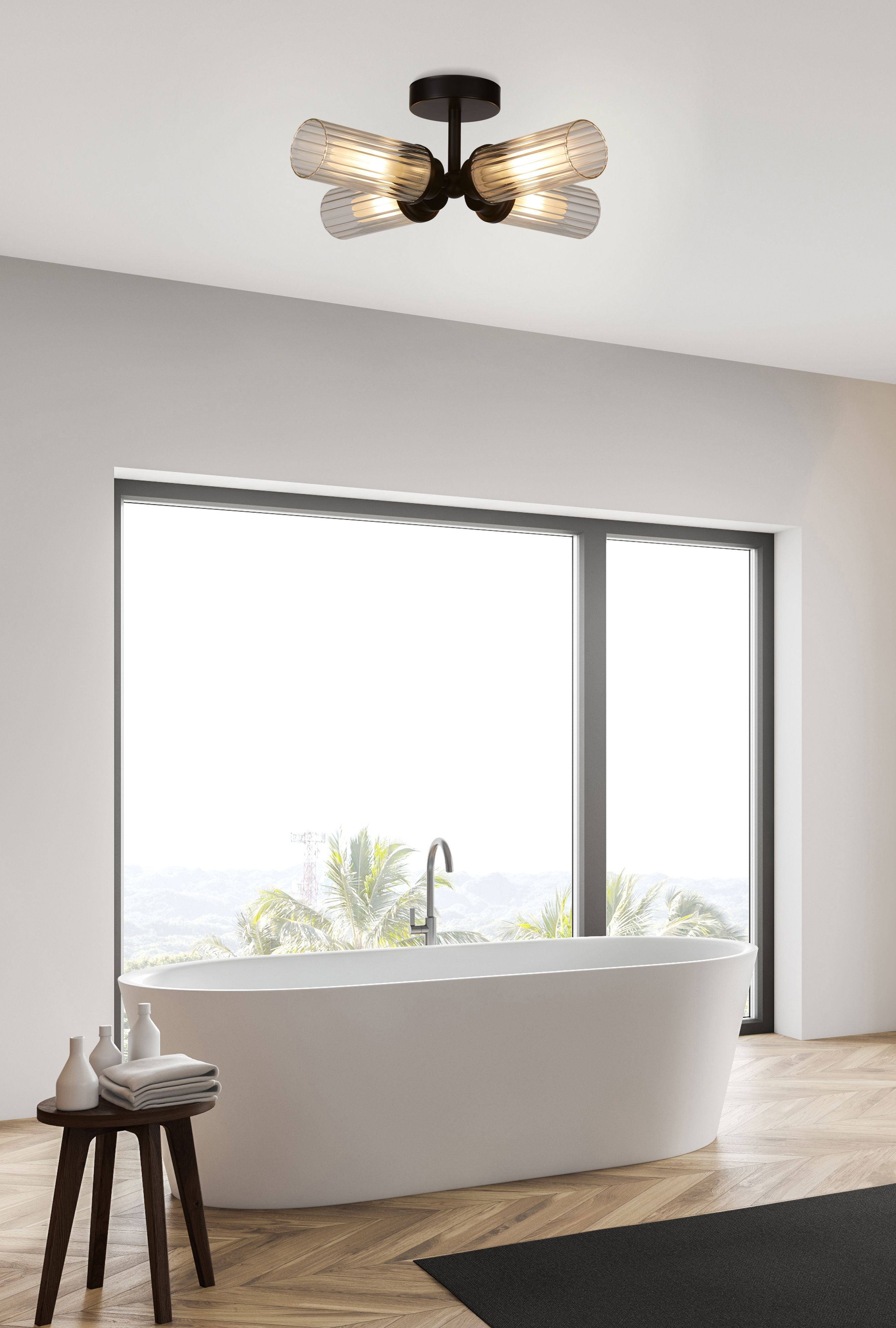 Searchlight Imperial 4 Light Flush ceiling light in black styled above a freestanding bath in a light bathroom with a large window