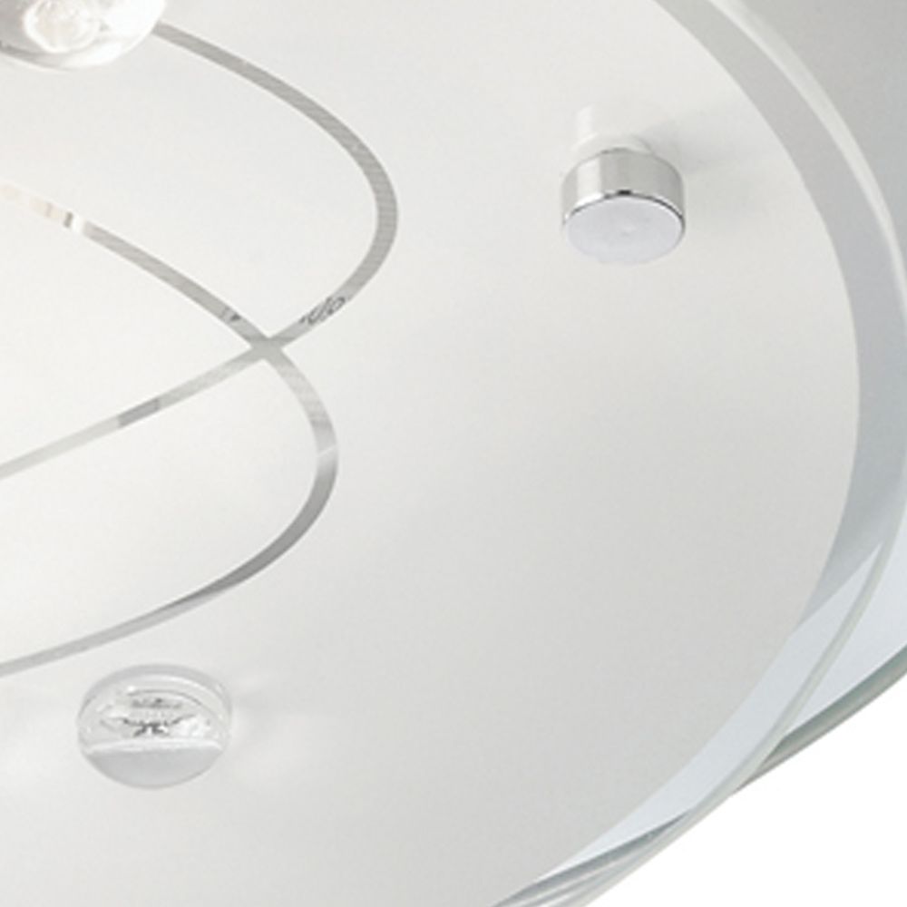 Close up of the etched spiral line, inset glass beads and chrome pin fixing on the Searchlight Cove flush ceiling light
