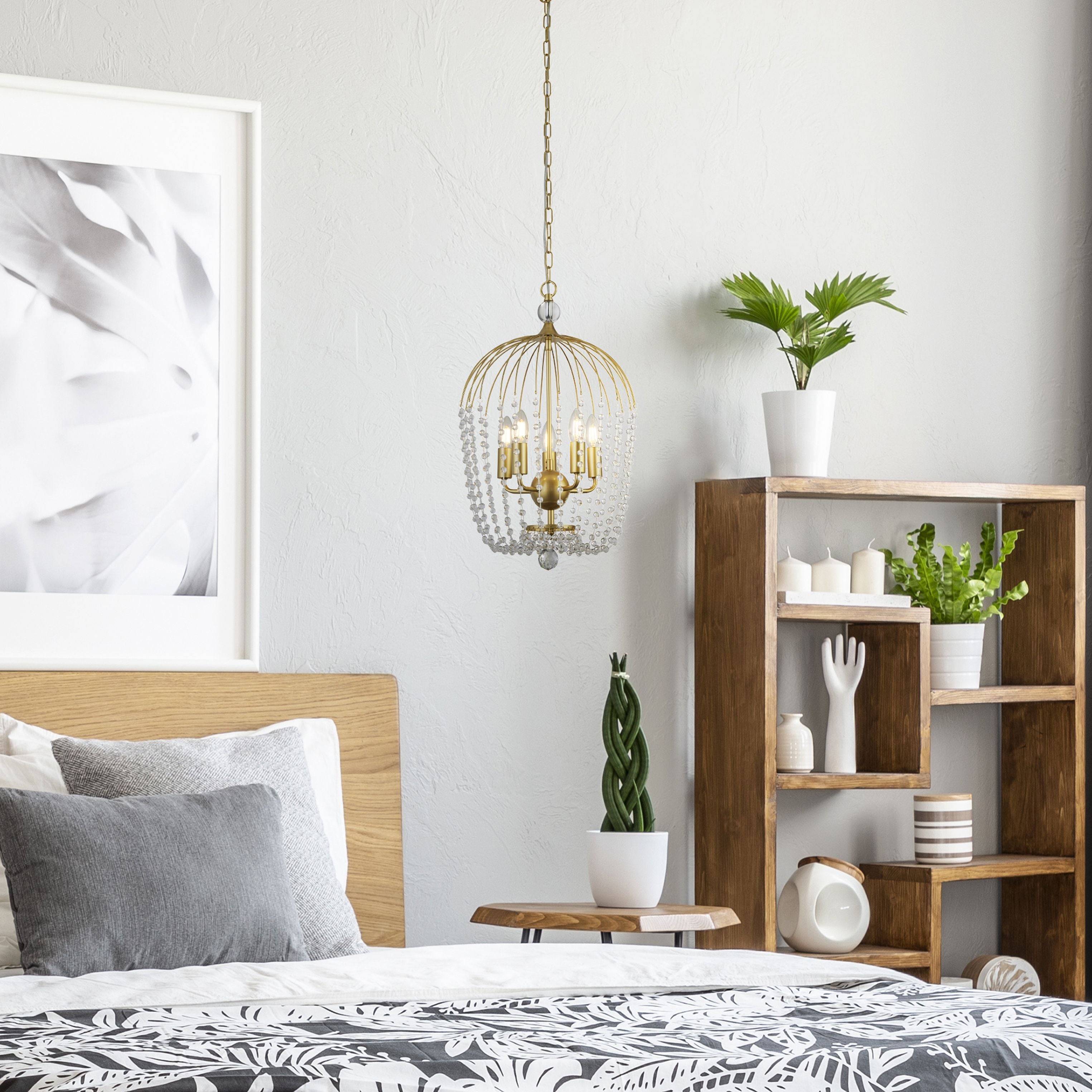 Shower 5 light gold pendant with clear crystal beading styled above a bedside table in a bedroom