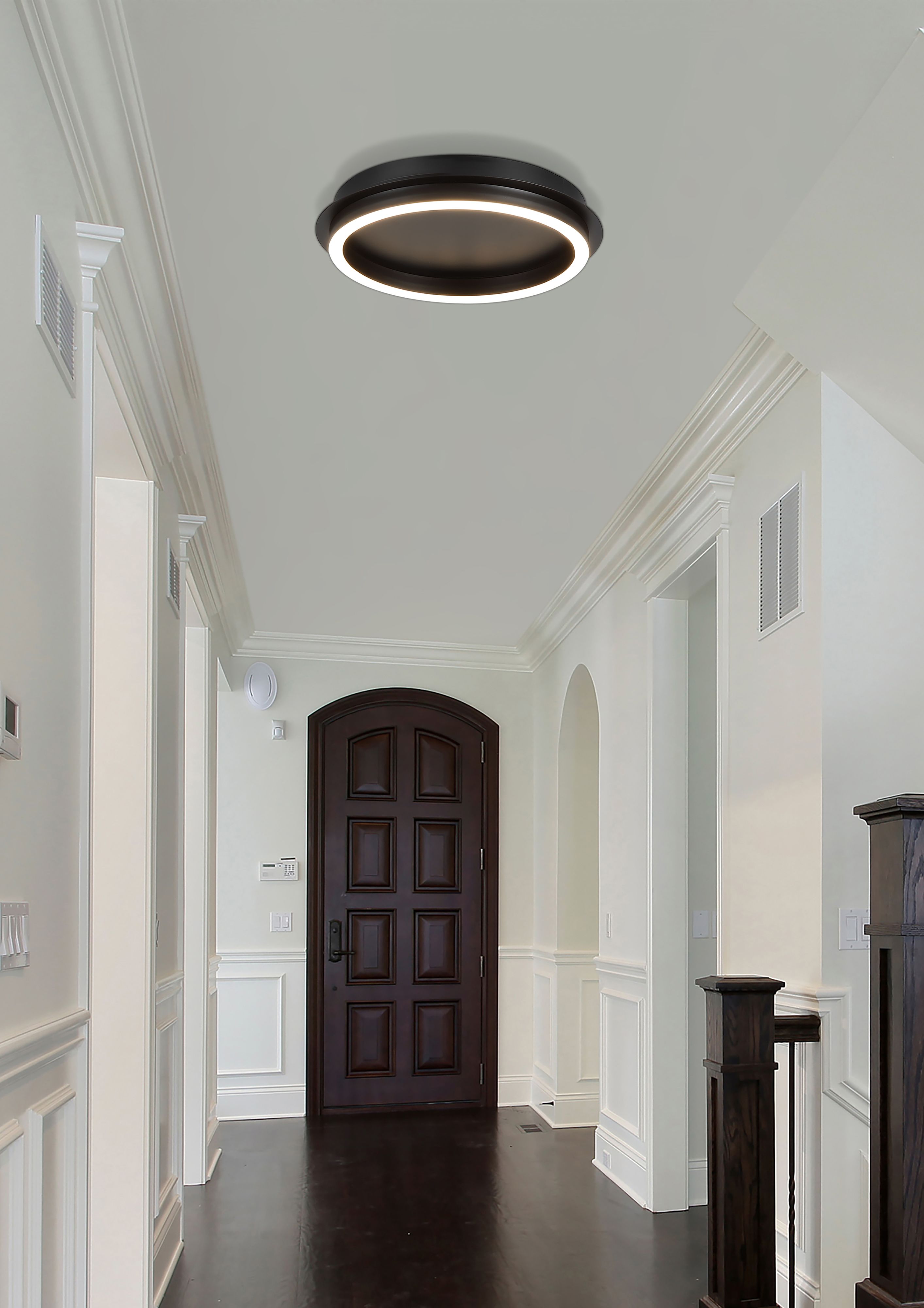 Searchlight Stellar LED ceiling lamp fitted in a hallway ceiling near a dark panelled front door, glowing warm white