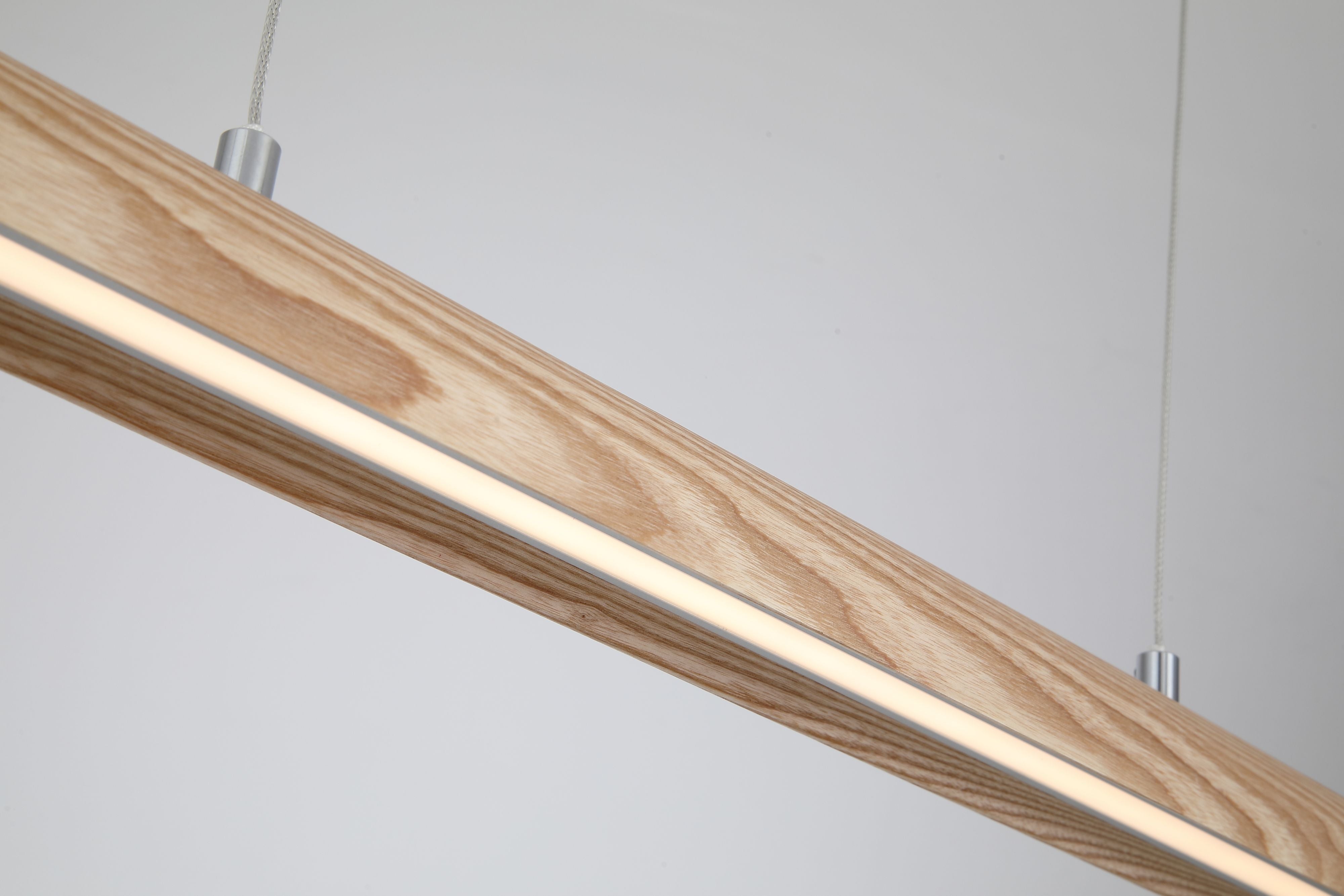 Close up of the Searchlight Kenzie pendant showing the natural ash wood grain and the glowing white acrylic diffuser strip