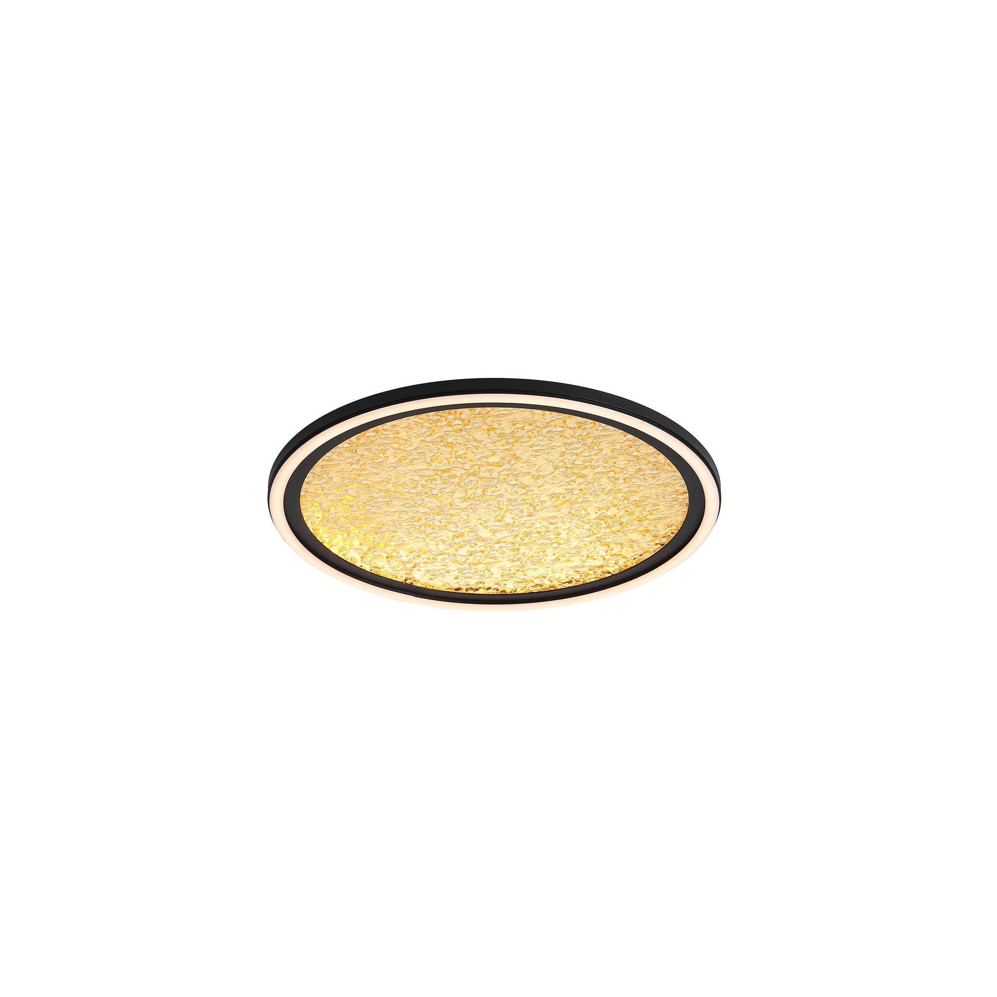 Searchlight Luna LED flush ceiling light in black and gold, angled studio shot showing the pebbled gold diffuser inside a matte black ring