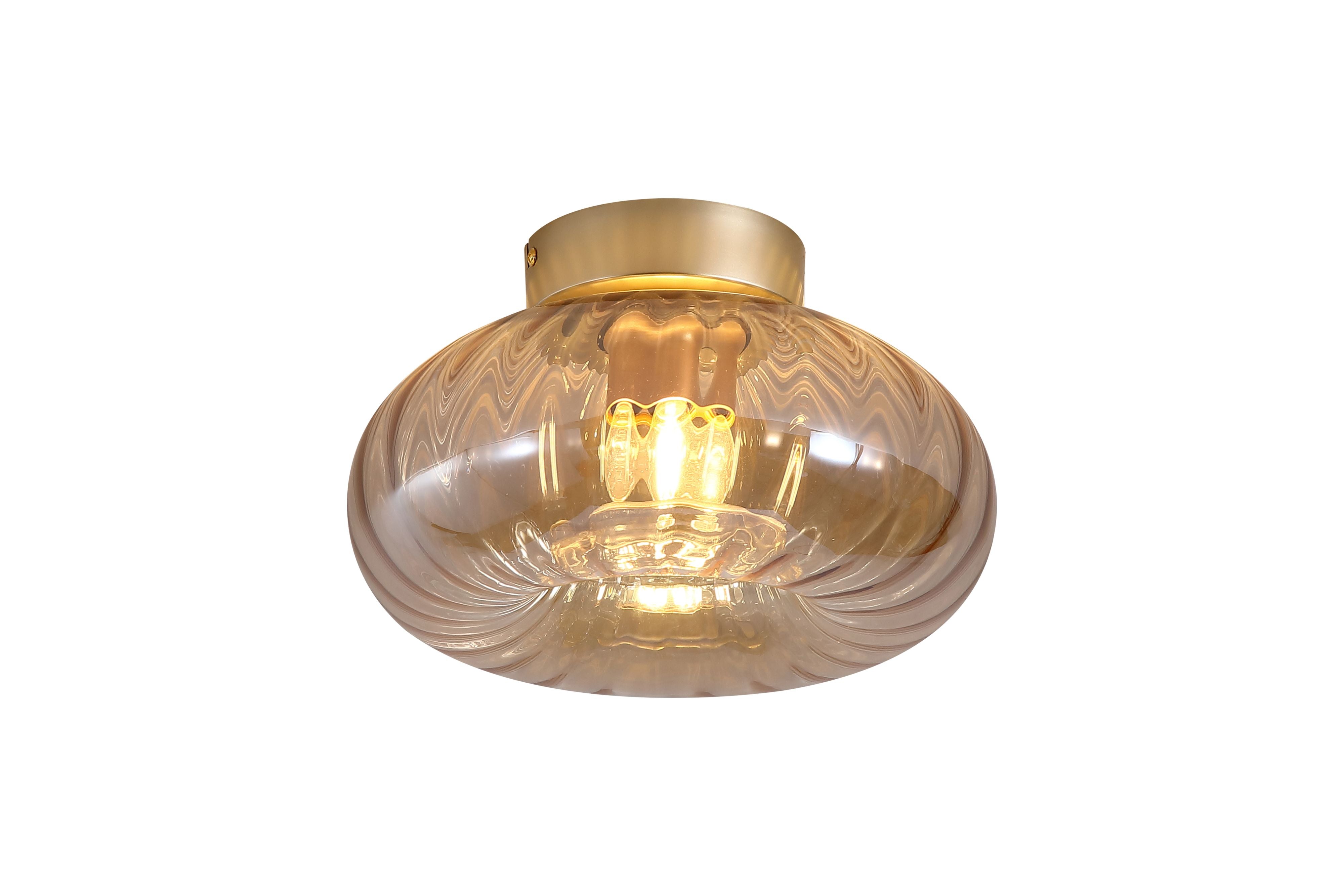Searchlight Celestial 1 light flush ceiling light in gold with ribbed amber glass, studio view showing the swirled glass texture lit from within