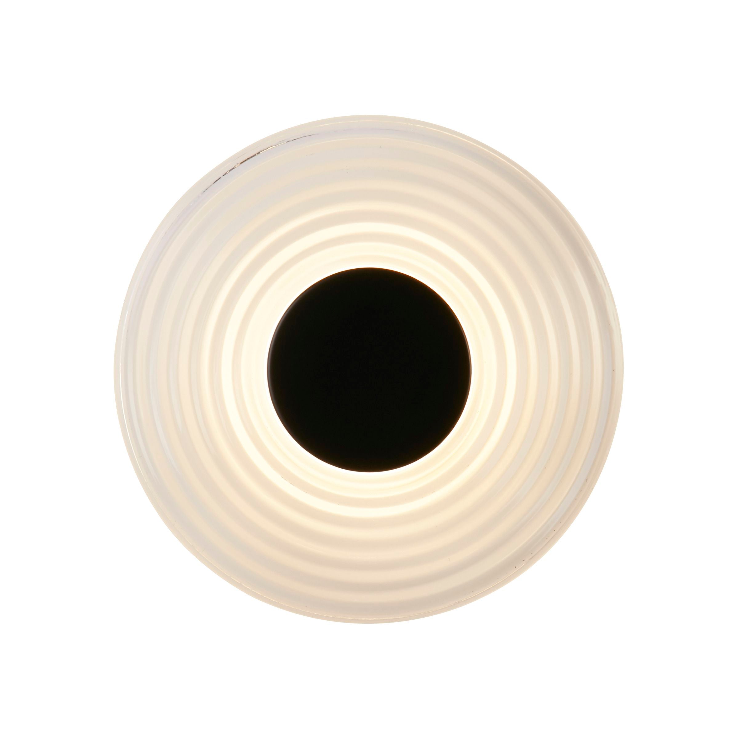 Searchlight Cleo LED wall light in matt black and clear glass, front on view showing the ribbed record inspired rings lit from behind