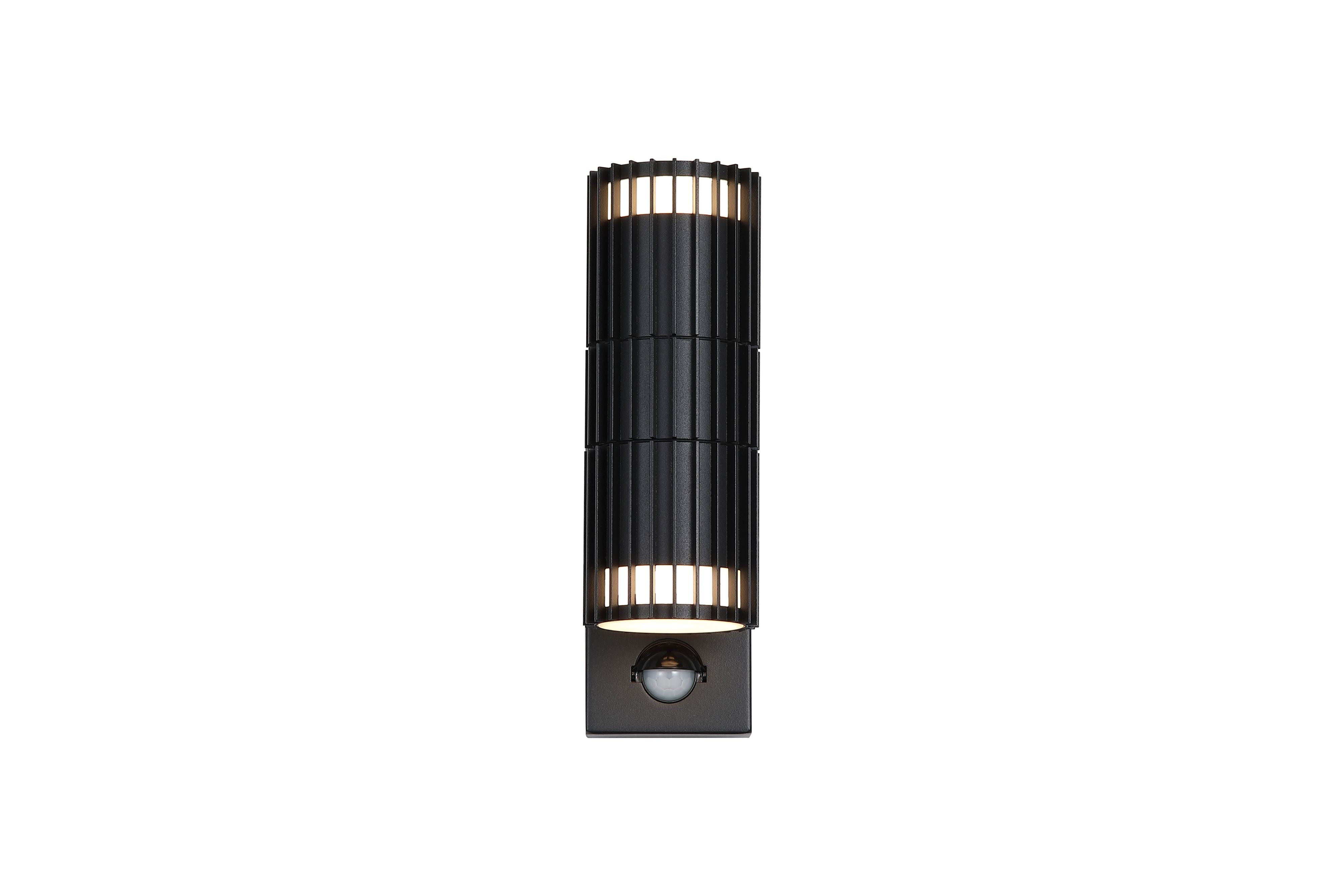 Searchlight Detroit PIR black outdoor wall light, front view on a white background, showing the ribbed fin shade, integrated motion sensor at the base and light glowing through the vents