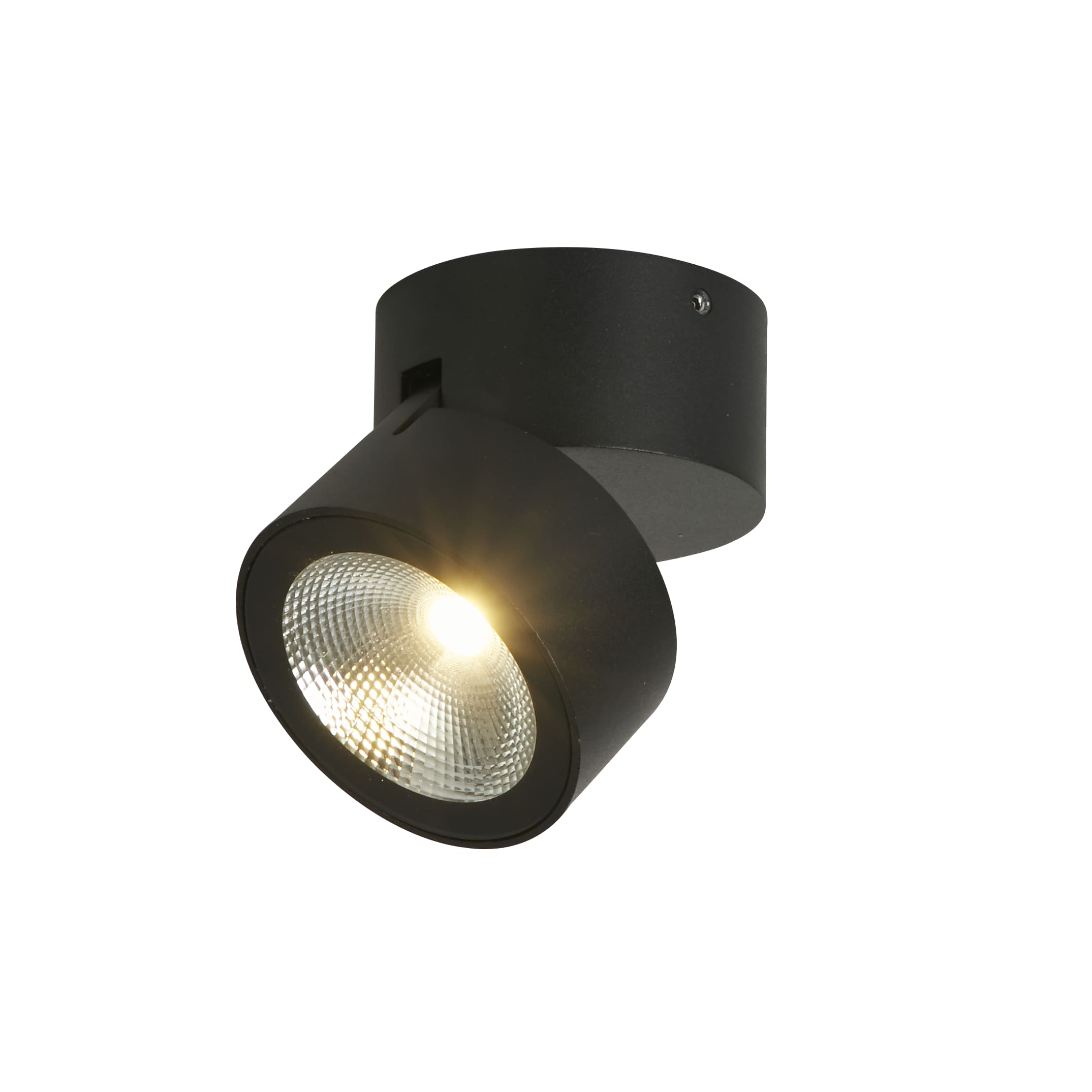 Searchlight Manhattan black adjustable spotlight on a white background, angled to show the pivoting head and warm LED glow through the clear lens