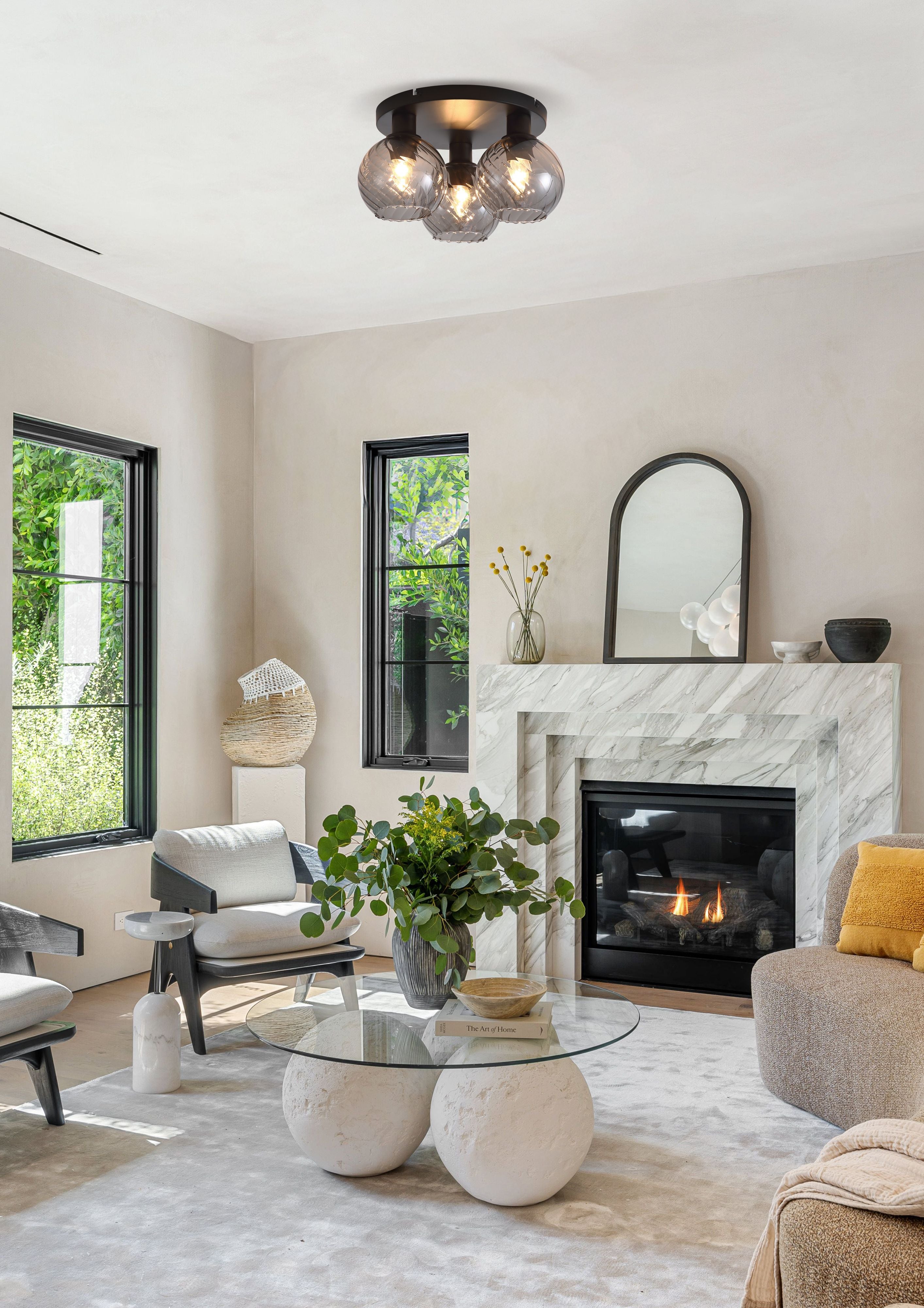 Radiance 3 Light Flush styled on a living room ceiling above a marble fireplace with armchairs and a coffee table