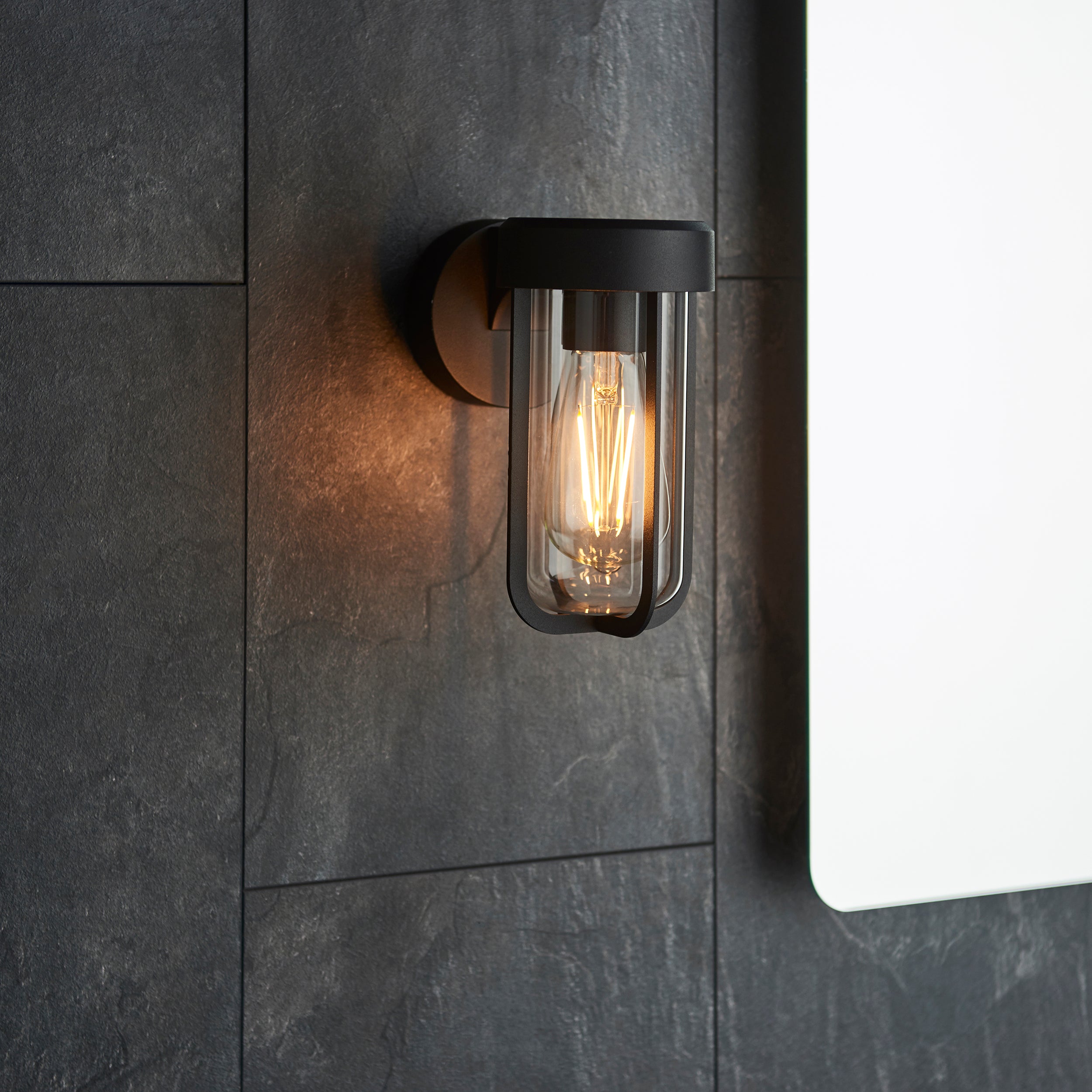 Utopia Pluto IP44 Wall Light - Matt Black And Clear Glass - E27