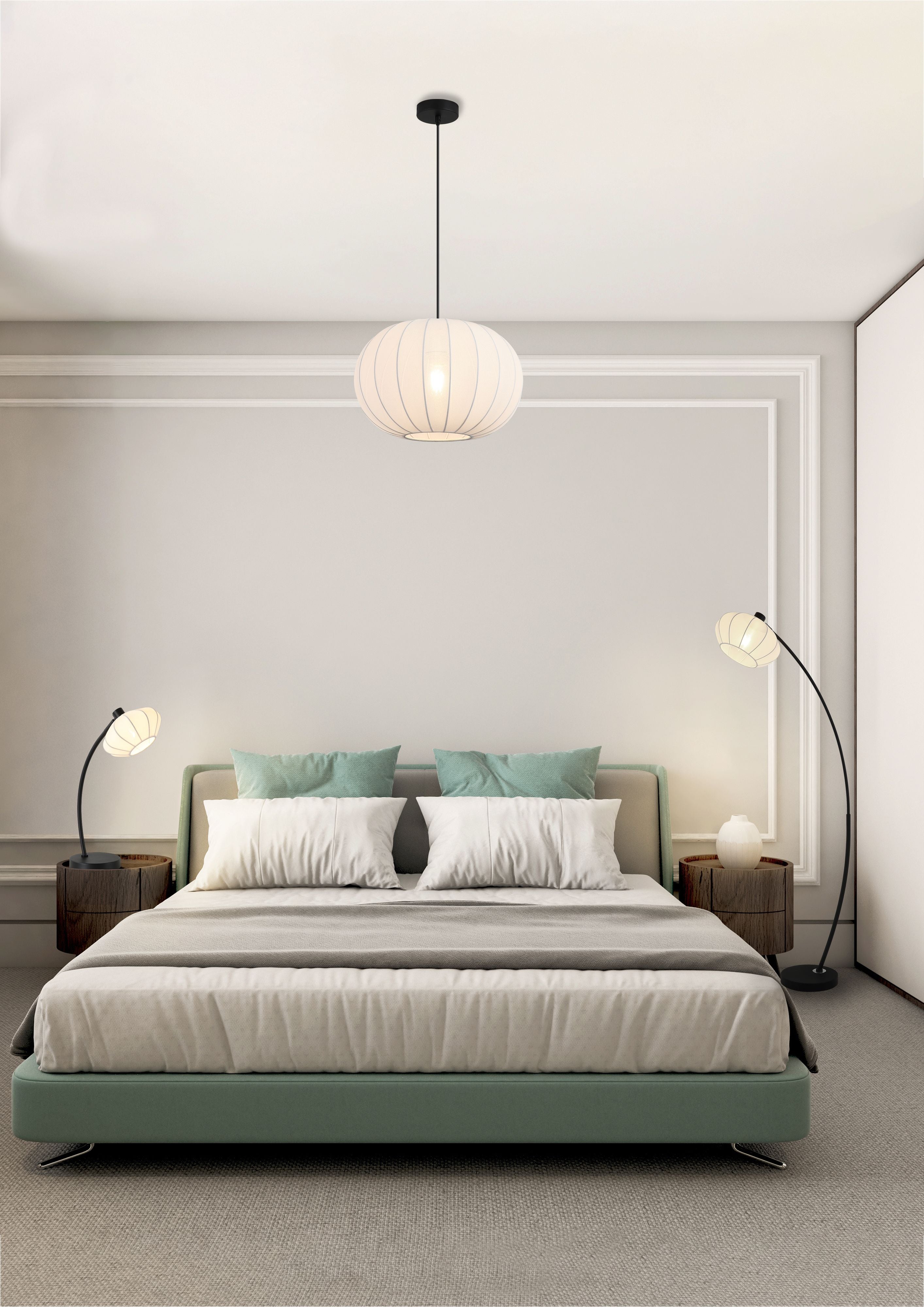 Radiant pendant styled above a bed with teal cushions, lit alongside a matching Radiant table lamp and floor lamp