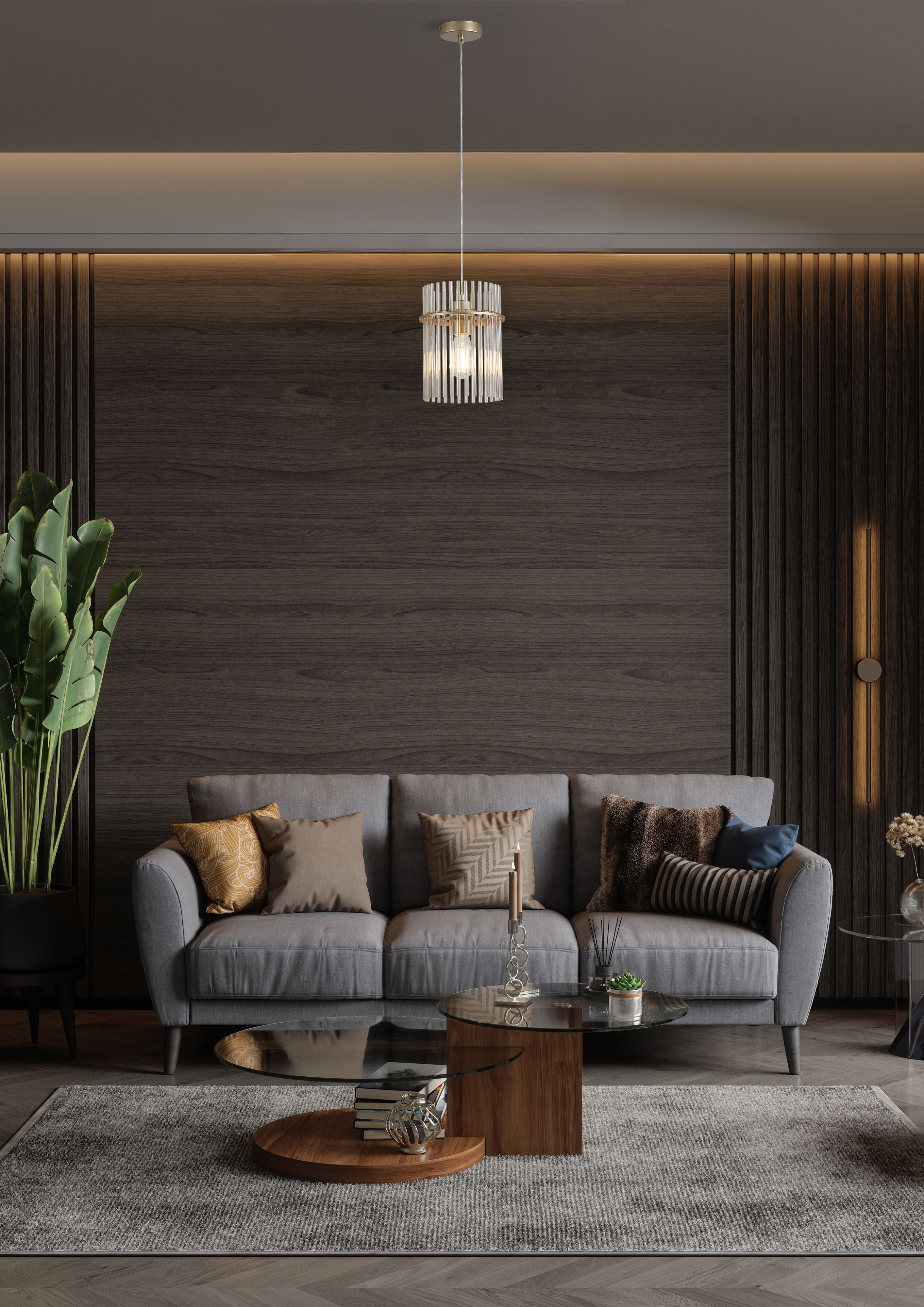 Searchlight Swizzle 20cm gold pendant light styled above a coffee table in a dark toned living room with a grey sofa