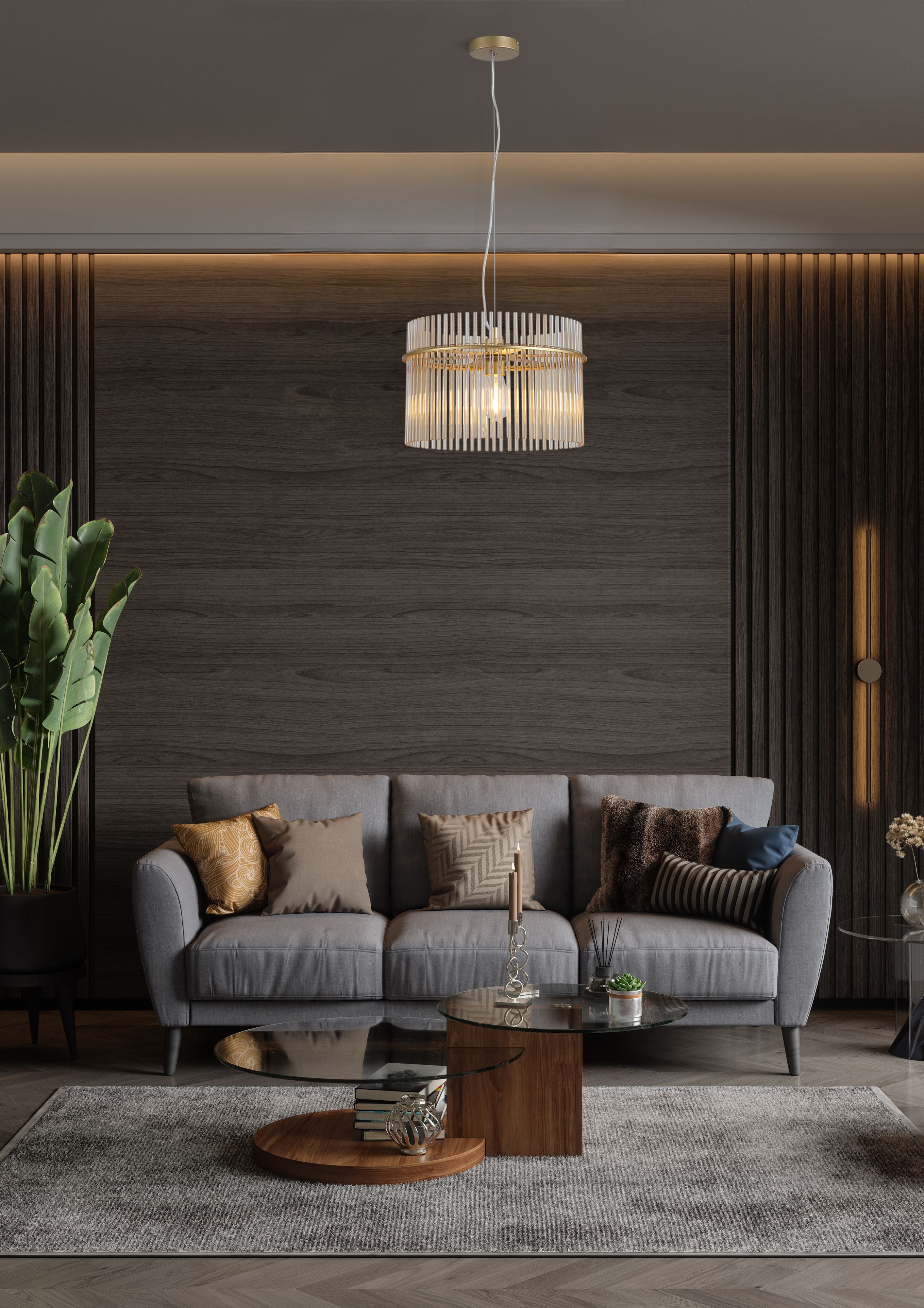 Searchlight Swizzle 40cm gold pendant light styled above a coffee table in a dark toned living room with a grey sofa