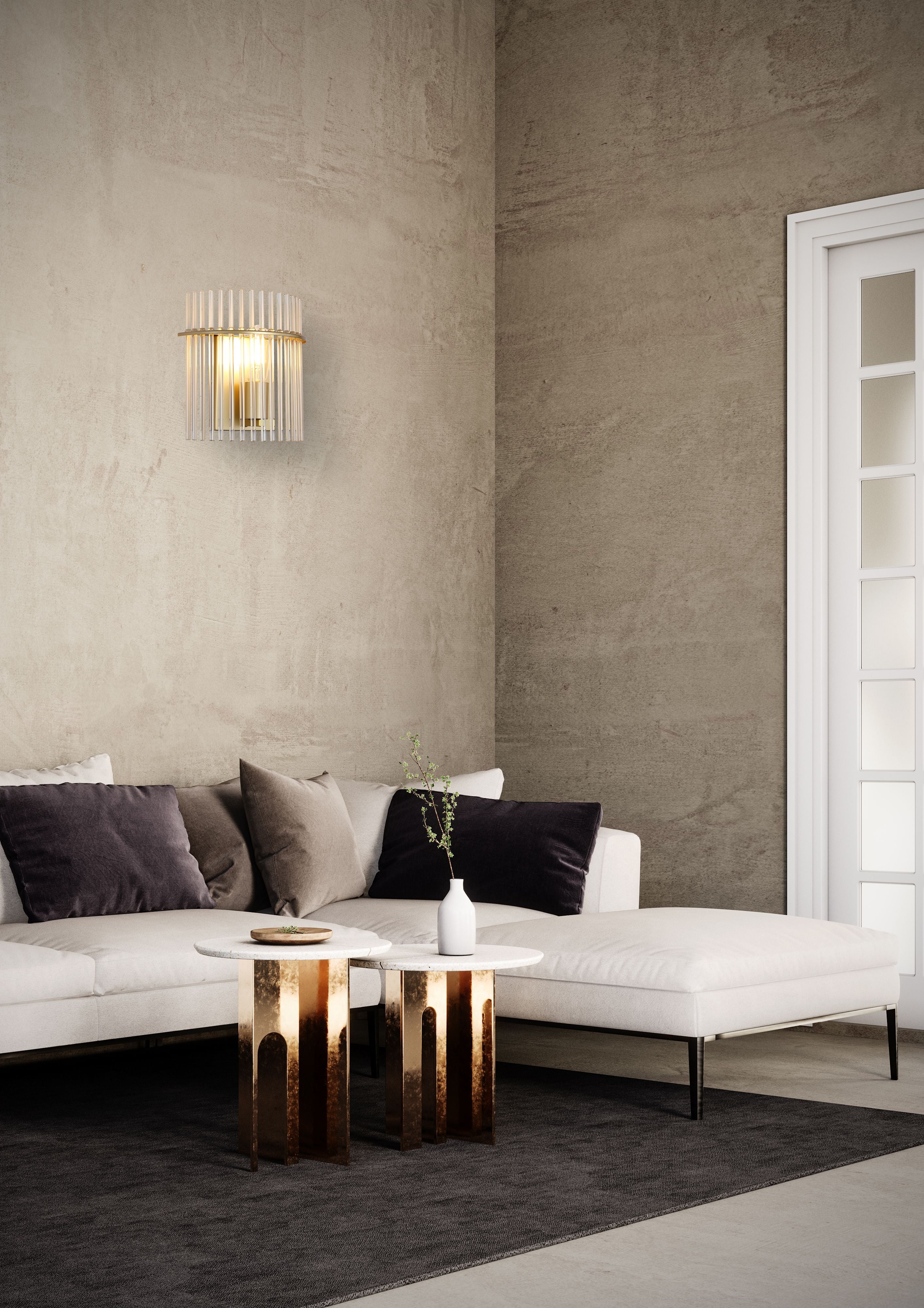 Searchlight Swizzle gold wall light styled on a plaster effect wall above a white corner sofa