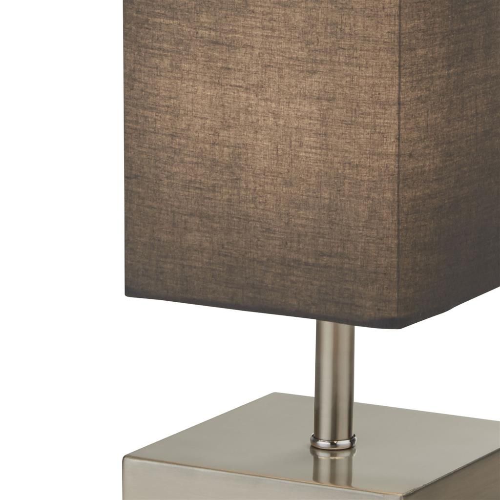Close up of the satin silver stem and square base joint beneath the dark grey shade on the Valley table lamp