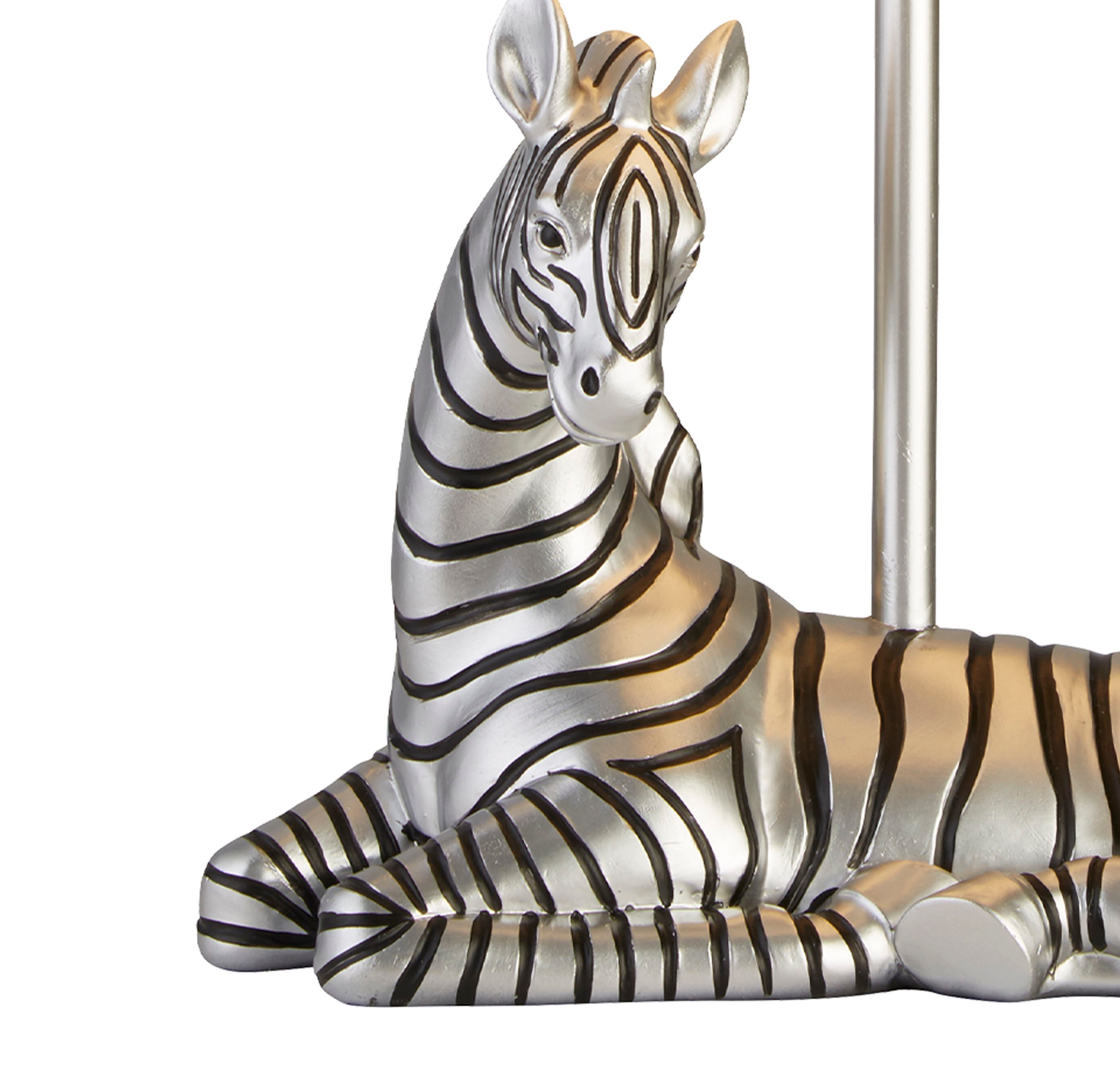 Close up of the silver resin zebra figure on the Zebra table lamp, showing the painted stripe detail on the head and neck