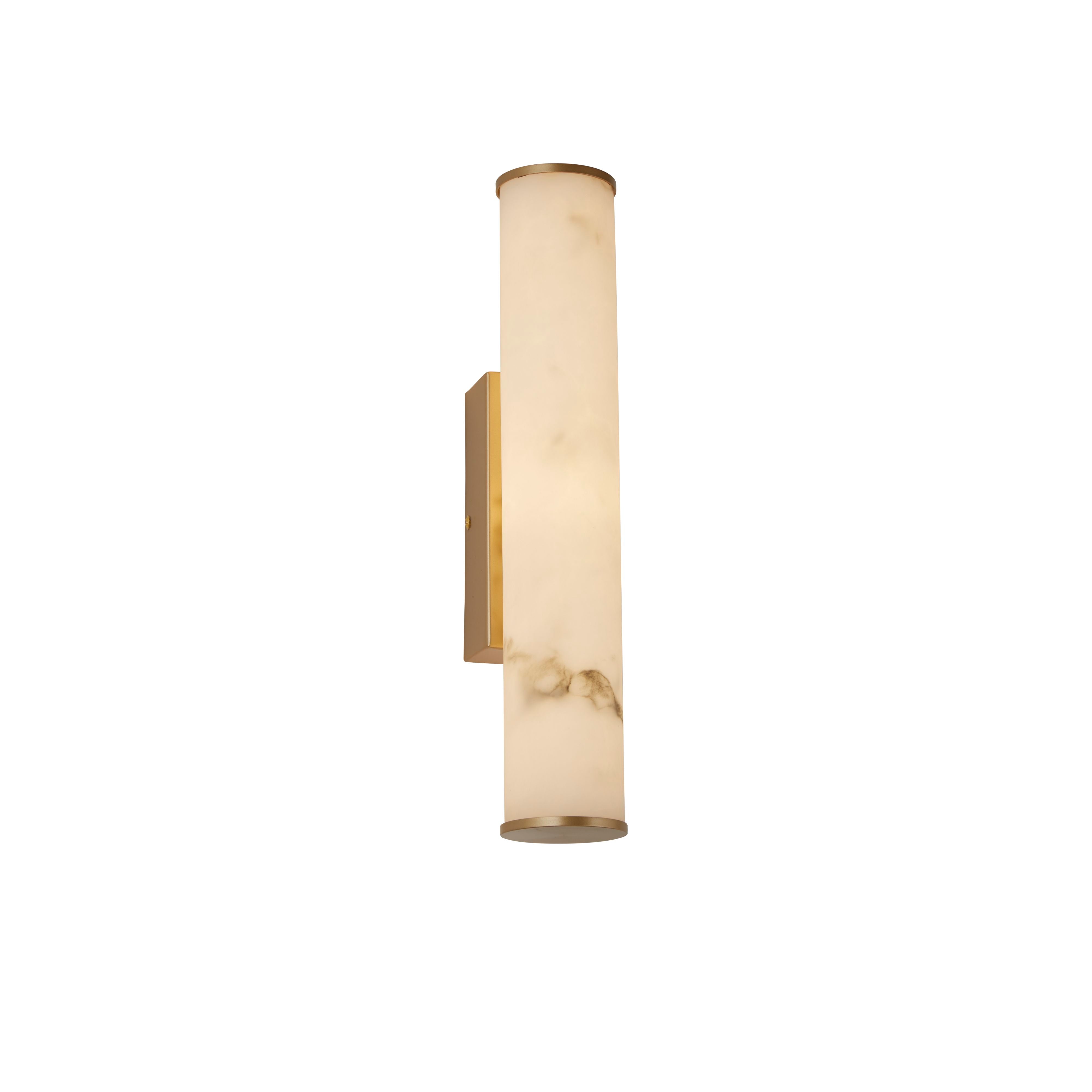 Searchlight Wales cylindrical LED wall light in matt gold with marble effect resin tube, angled studio shot